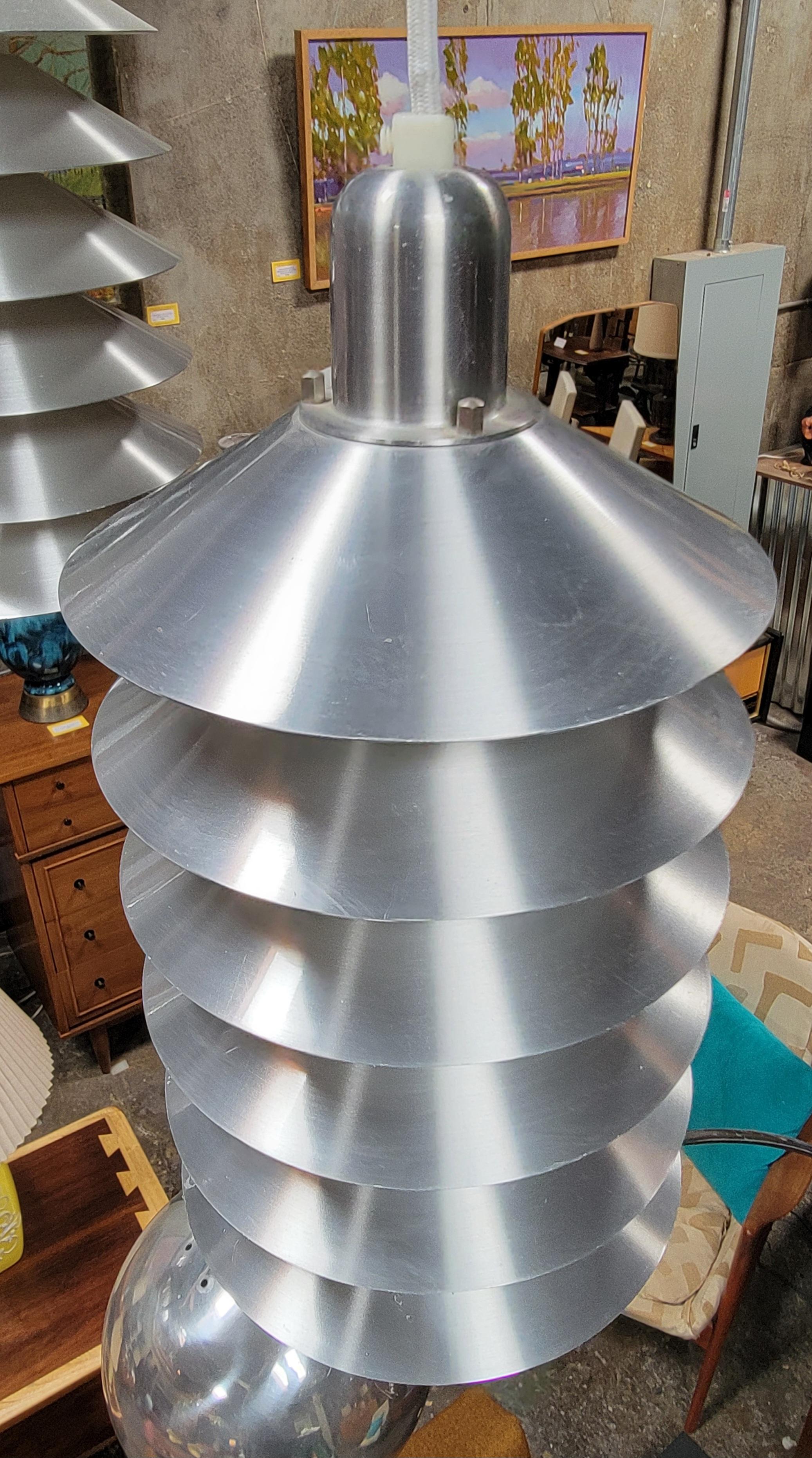 A polished aluminum ceiling fixture attributed to Jørgen Gammelgaard. 