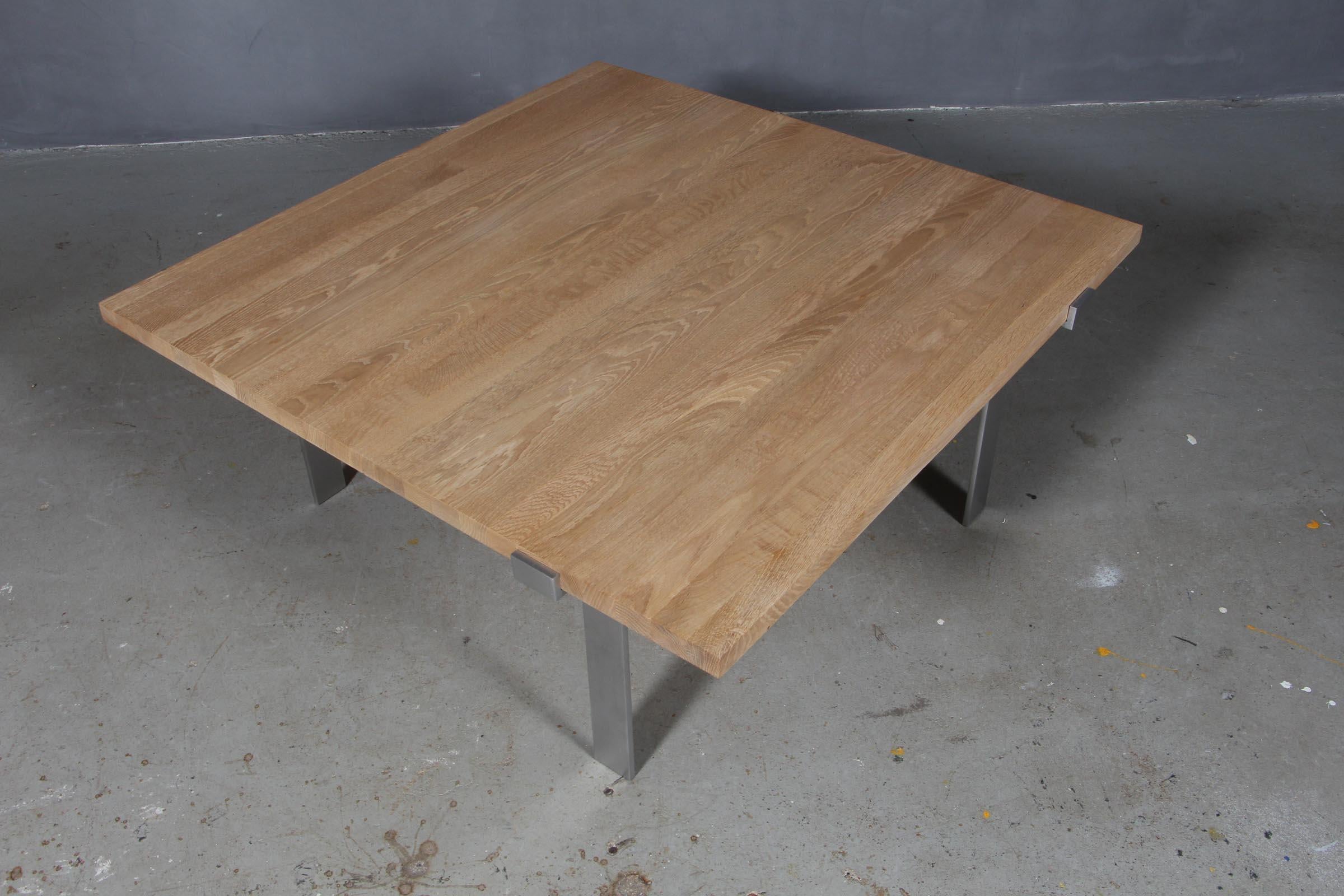 Jørgen Høj coffee table with plate of solid oak.

Frame of steel. 

Made by Niels Vitsøe.

Jørgen Høj was working together with Poul Kjærholm.