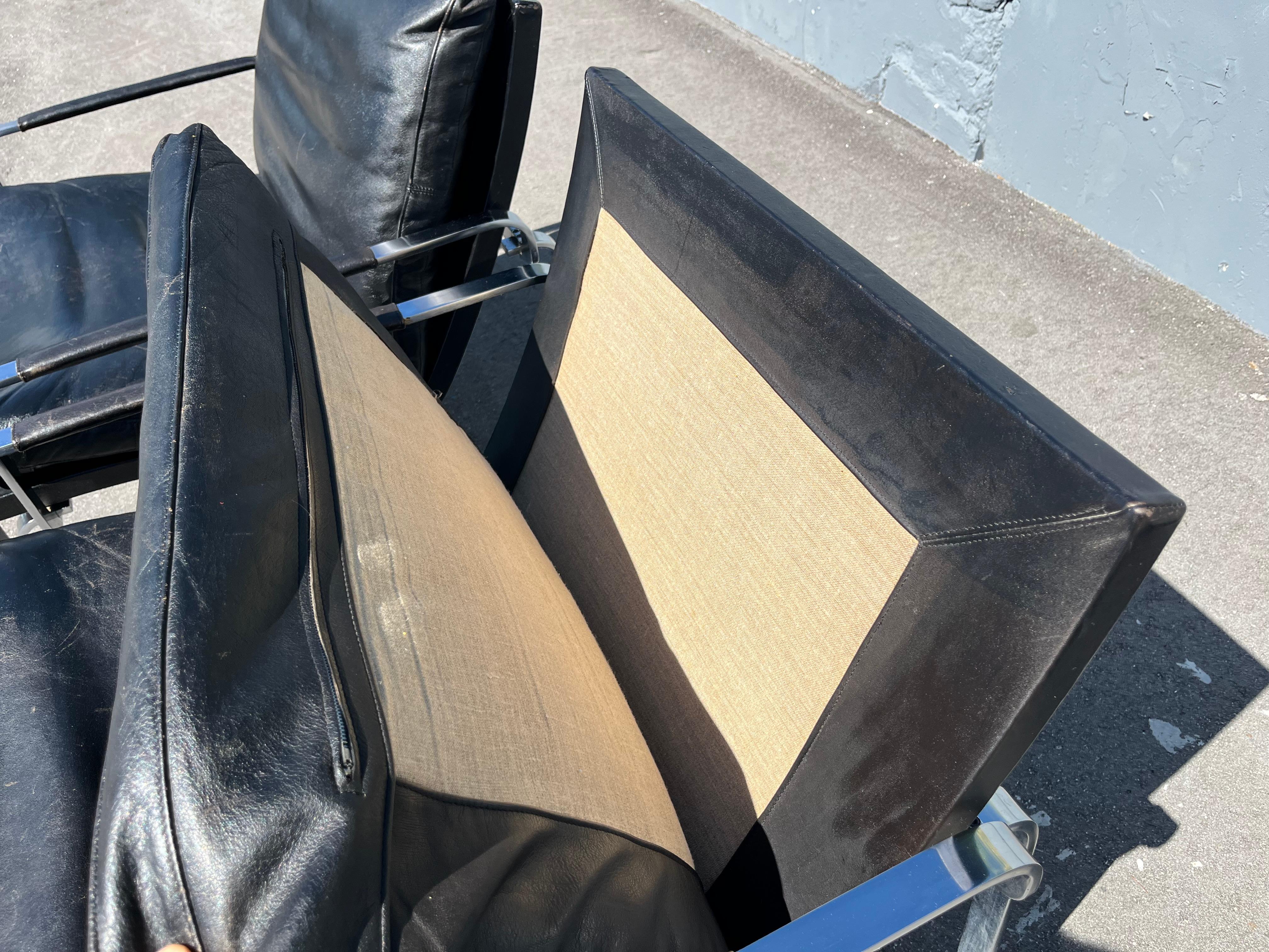 Jørgen Lund & Ole Larsen Loungesessel-Paar aus schwarzem Leder im Angebot 5