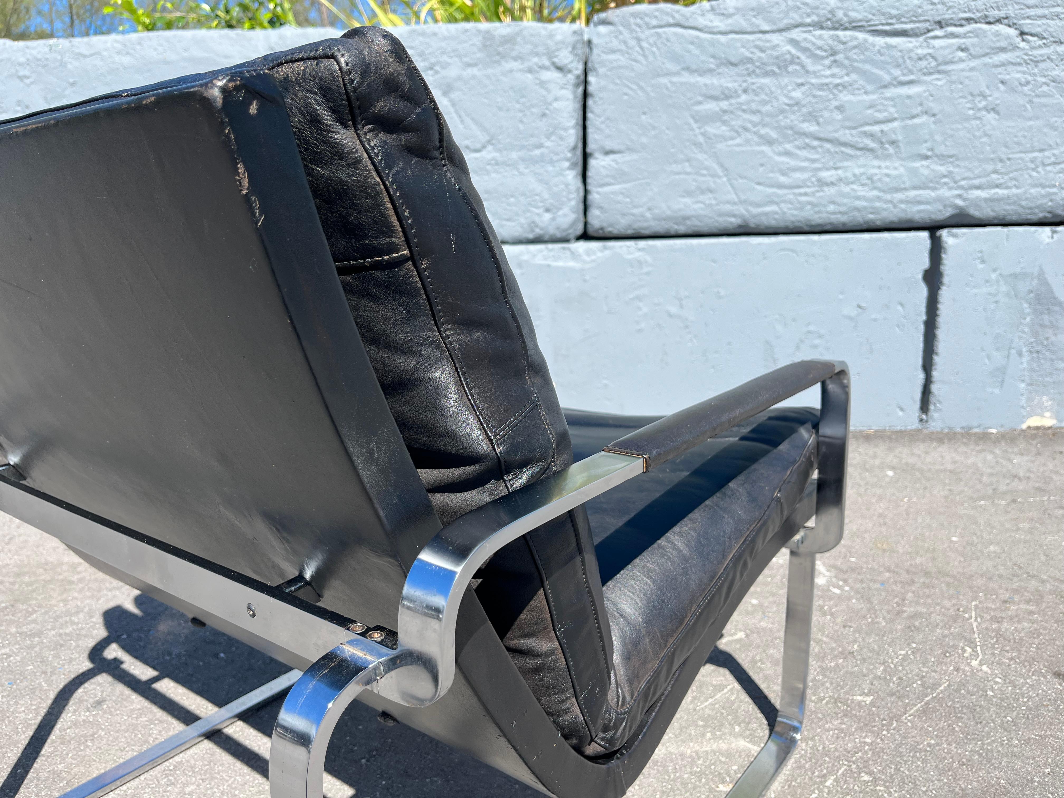 Jørgen Lund & Ole Larsen Loungesessel-Paar aus schwarzem Leder im Angebot 1