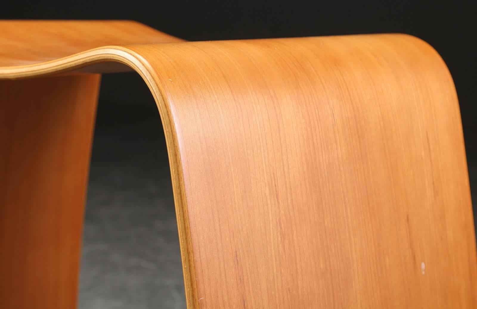 Curved cherry veneer by Jørgen Møller designed 2000 for Askman.
 