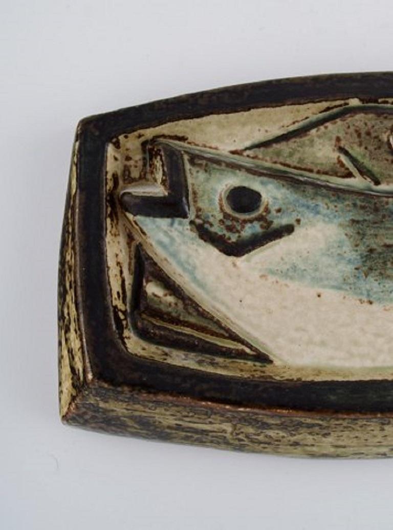 Jørgen Mogensen for Royal Copenhagen. Wall plaque in glazed stoneware with fish in relief. Dated 1967.
Measures: 26 x 16 cm.
In excellent condition.
Signed and stamped.