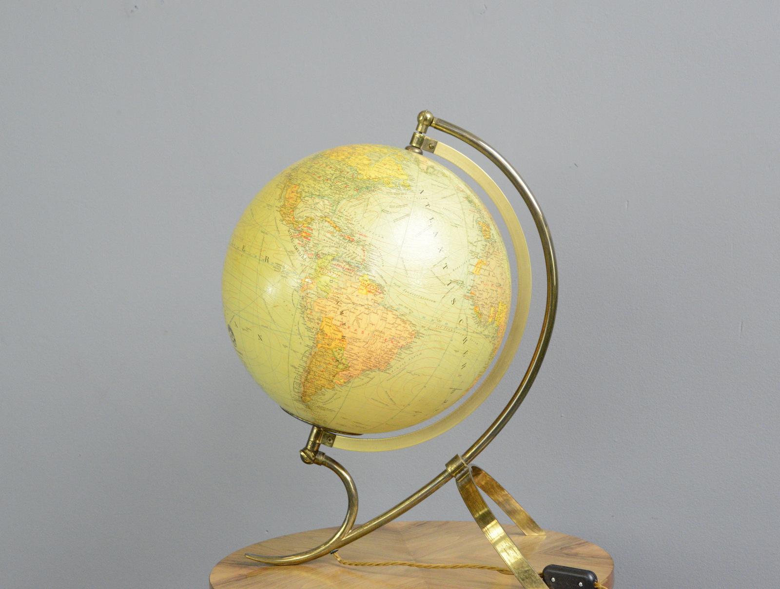 JRO globus light up desk globe, circa 1940s

- Glass globe
- Adjustable brass arm
- On/off switch on the cord
- Takes 1X E14 bulb
- German, late 1940s
- Measures: 50cm tall x 36cm deep x 30cm wide 

Condition report

Fully re wired with