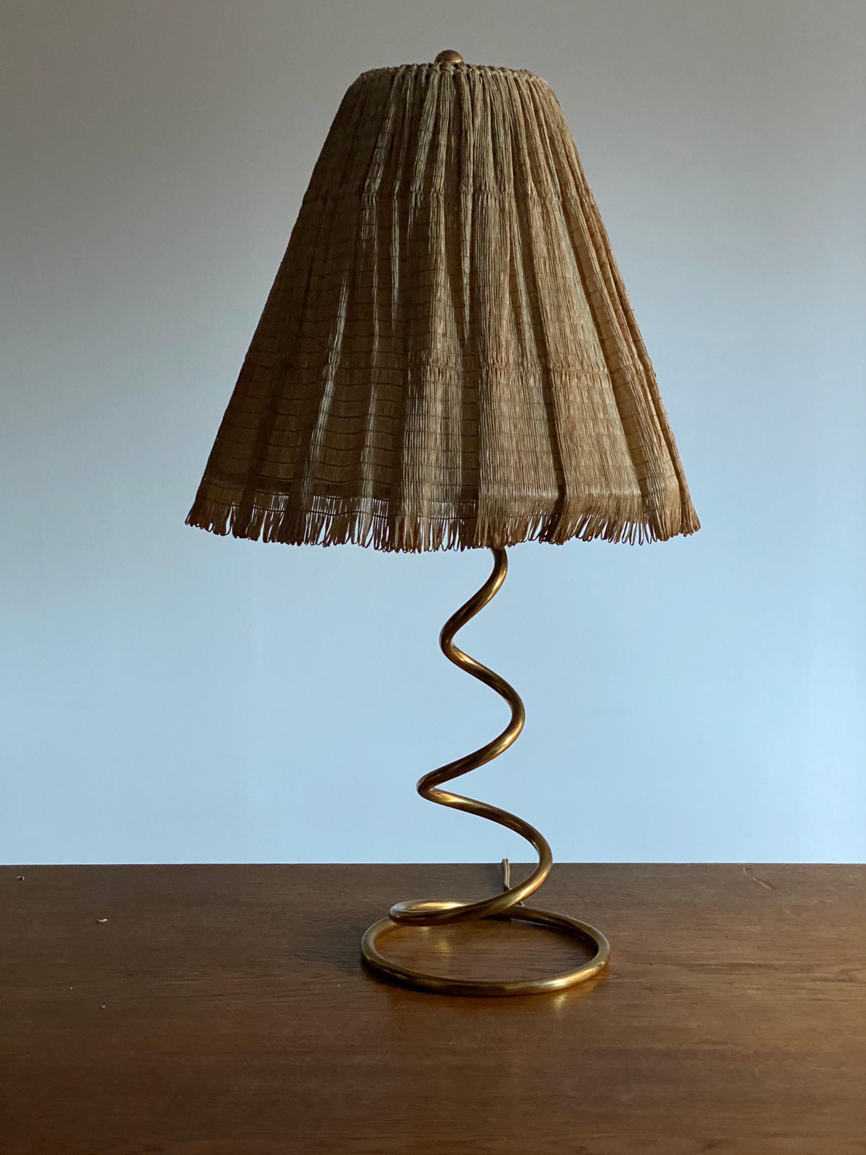 An organic spiral lamp. Design and production attributed J.T. Kalmar. Produced in Germany, 1950s. 

Other designers of the period include Paavo Tynell, Josef Frank, Angelo Lelii, and Max Ingrand.