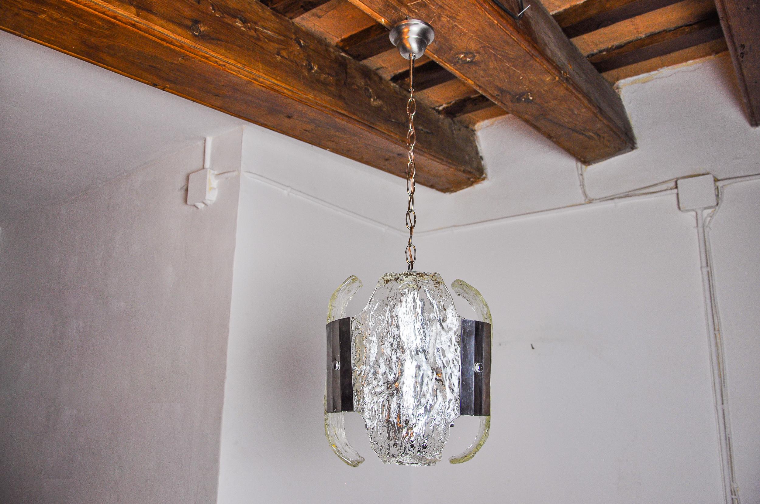 Superb and rare JT Kalmar chandelier designed and produced in Austria in the 1970s. Frosted Murano glass crystals geometrically distributed around a chromed metal structure. Unique piece that will bring a real touch of design to your interior.