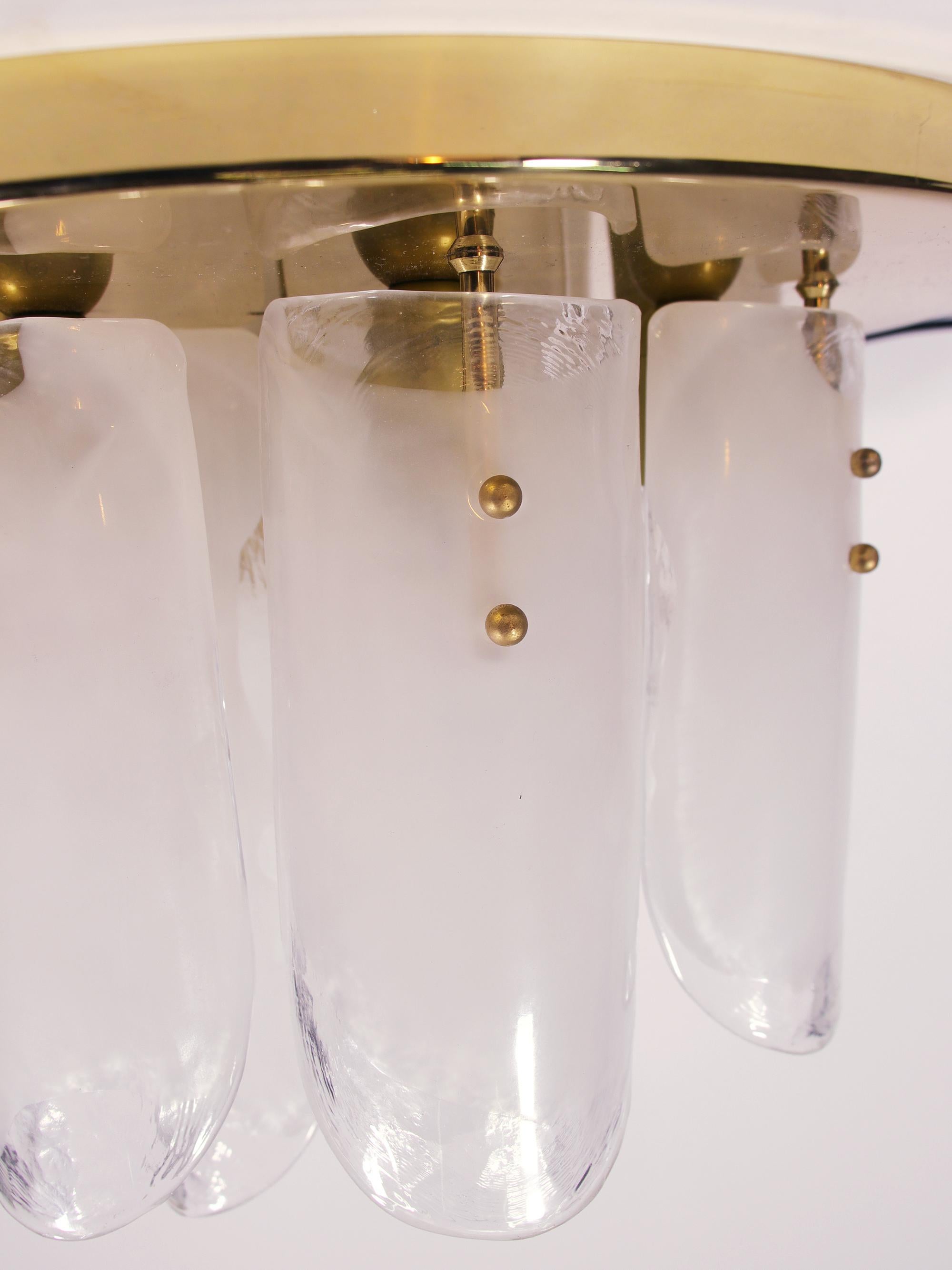 Elegant flush mount chandelier with 12 clear and white Murano glass elements on brass frame. Manufactured by J.T. Kalmar, Vienna, Austria in the 1960s. 

Design: Julius Theodor Kalmar. 
Measures: diameter 19.7