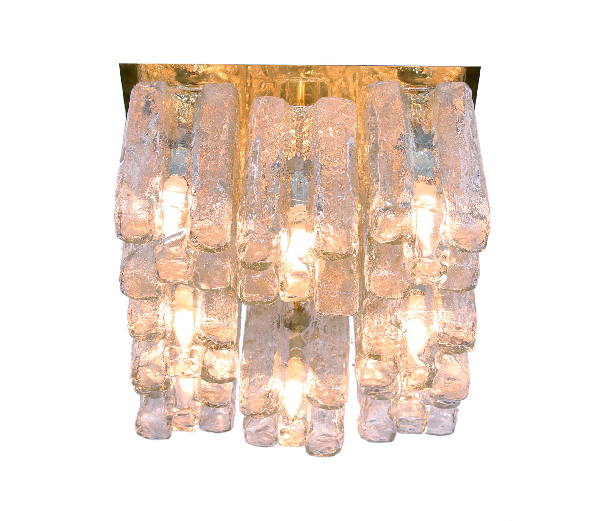 Elegant flush mount chandelier by JT Kalmar, model: Granada. 
Hanging glass resembles icicles. Chandelier illuminates beautifully and offers a lot of light. Excellent vintage condition.  
The lamp takes eight small E14 Edison bulbs. 
Measurements: