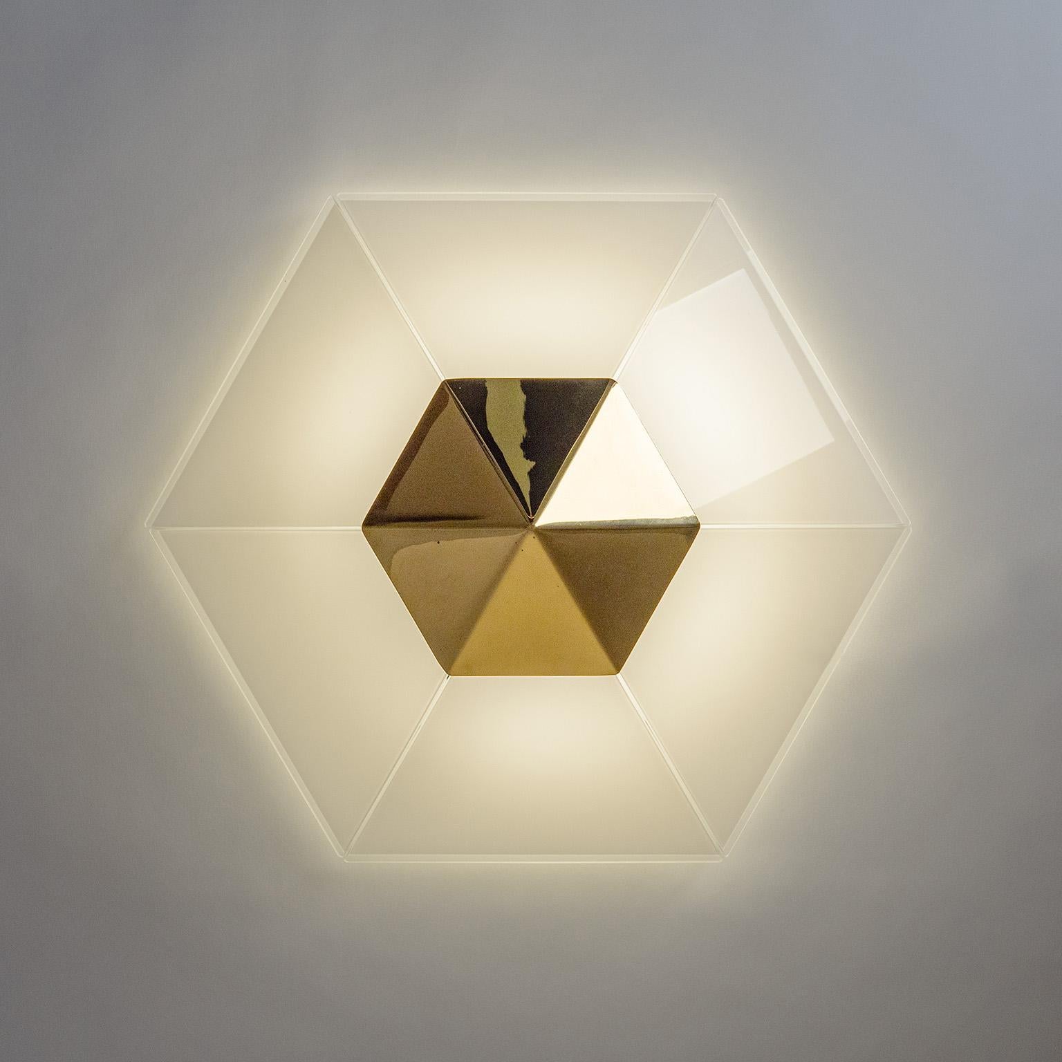 Fine hexagonal ceiling light by J.T. Kalmar from the 1980s. Inverted six-sided pyramid with glass sides and a large polished brass top. The glass panes have a white casing and are facetted on the top edge to reveal the clear glass underneath. Six