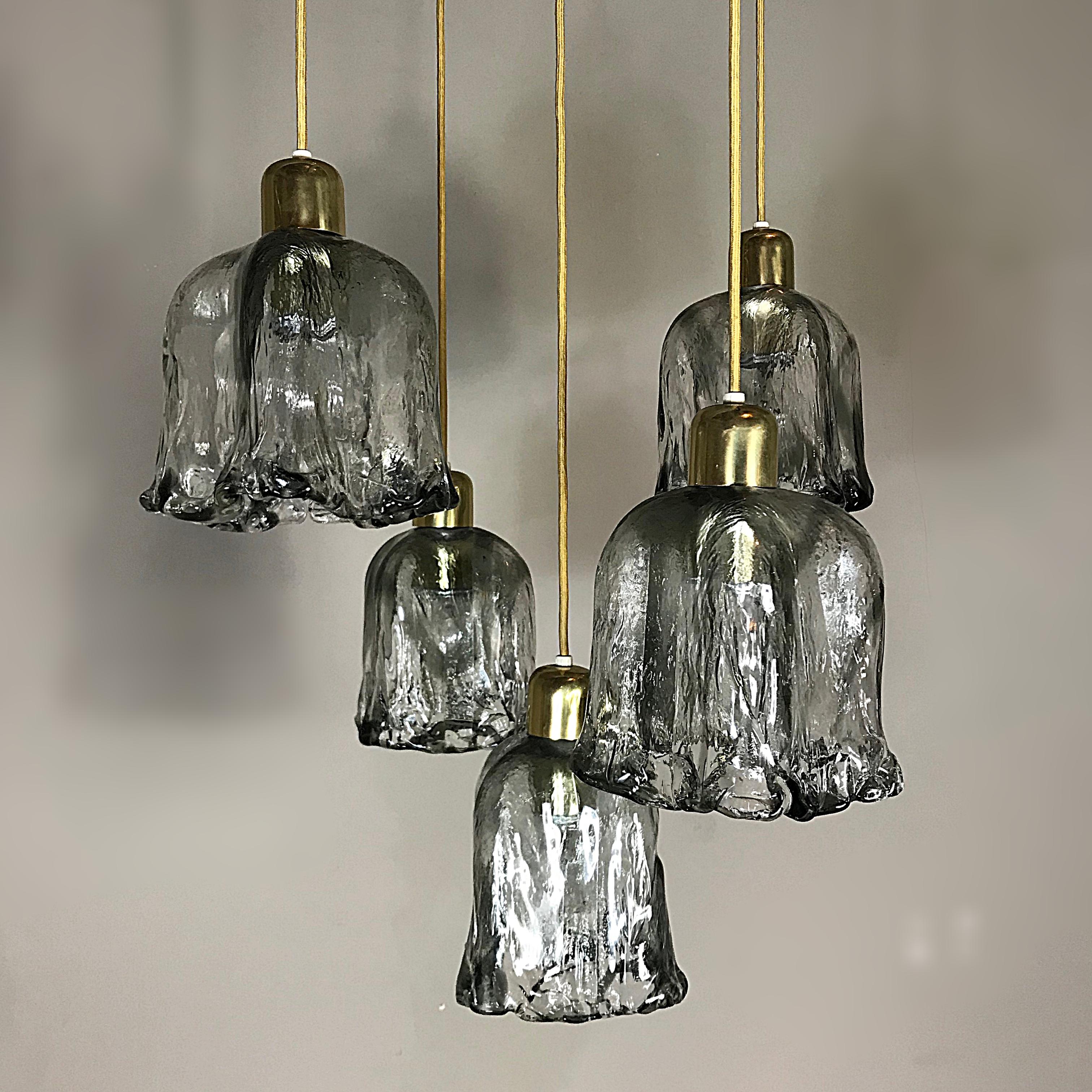 Beautiful high quality midcentury chandelier by J.T. Kalmar, made in Austria in 1960s. Five-tier textured handblown Murano glass in tulip form with brass spider. The cables can be adjusted per chandelier to alter the required height. Each glass