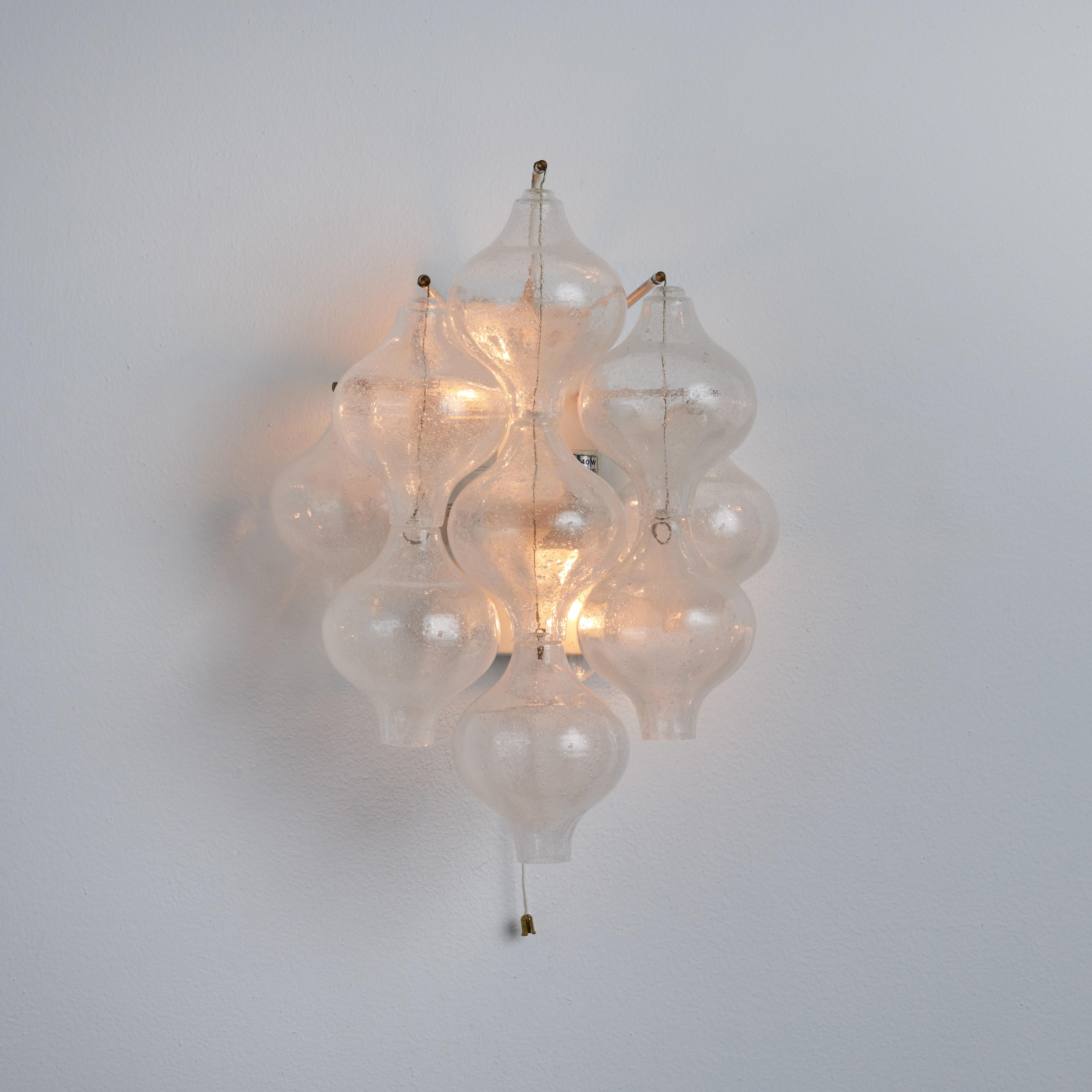 JT Kalmar 'Tulipan 9WA' 9-Globe Blown Murano Glass Wall Sconce. 

Executed in hand-blown Murano glass globes with a white painted metal structure and brass accents. Designed by JT Kalmar, many Kalmar Franken pieces of the era featured 'pulegoso', or