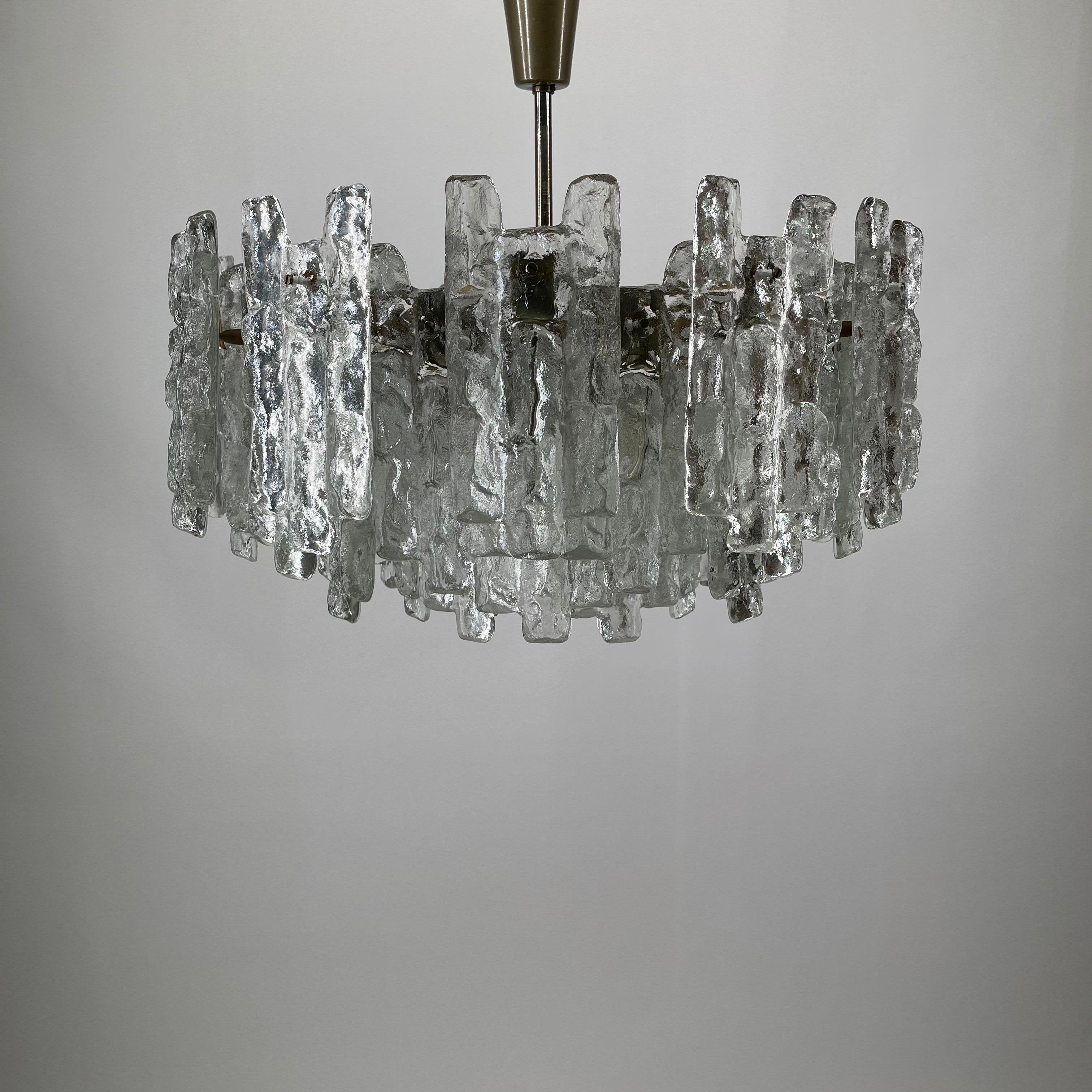 J.T. Kalmar XL chandelier Model 'Soria' Frosted Ice Glass, Austria 1960s. 36 Ice-Glass Plates with 12 light bulbs.