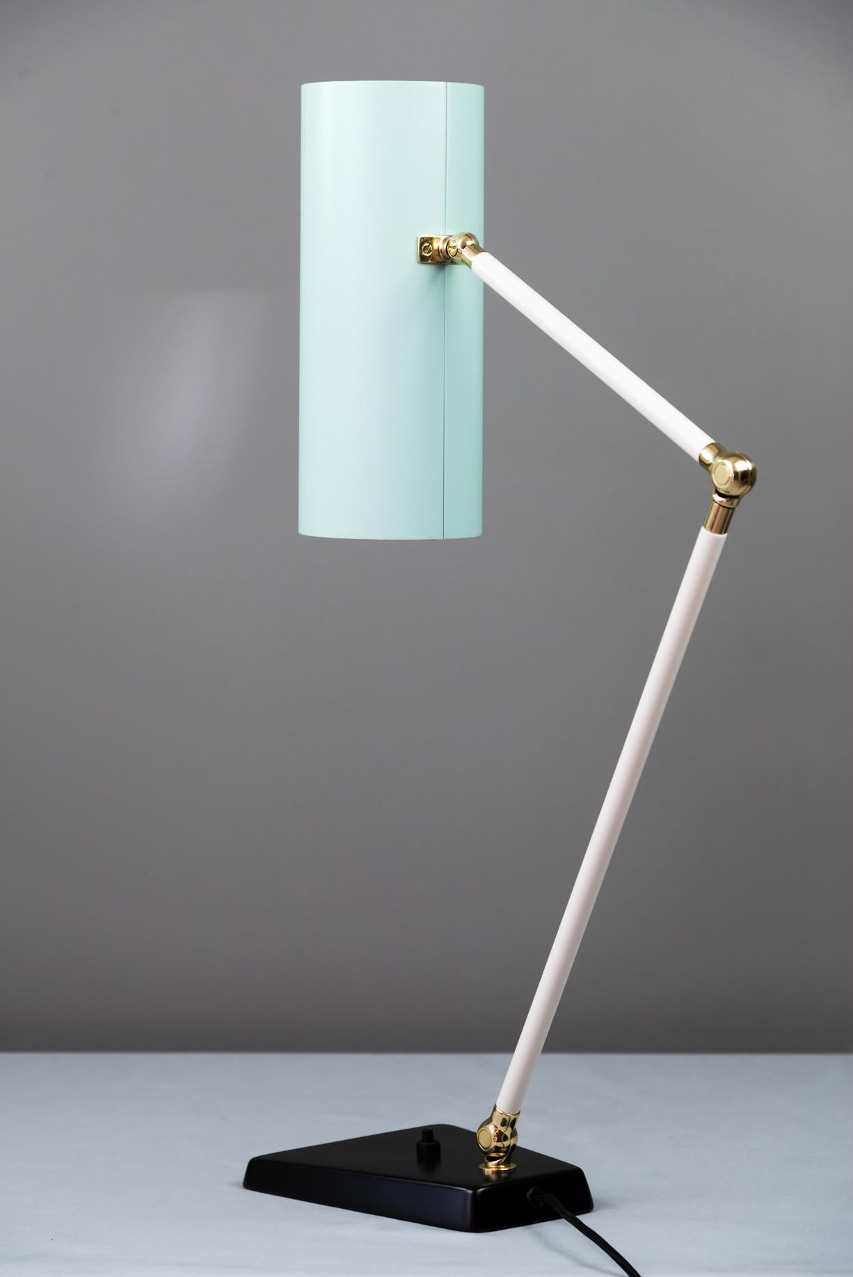 Swiveling J.T. Kalmar table lamp, Vienna, circa 1960s
Restored
Metal and aluminium painted
Brass polished and stove enameled
Completely stretched out is the lamp 84 cm.
