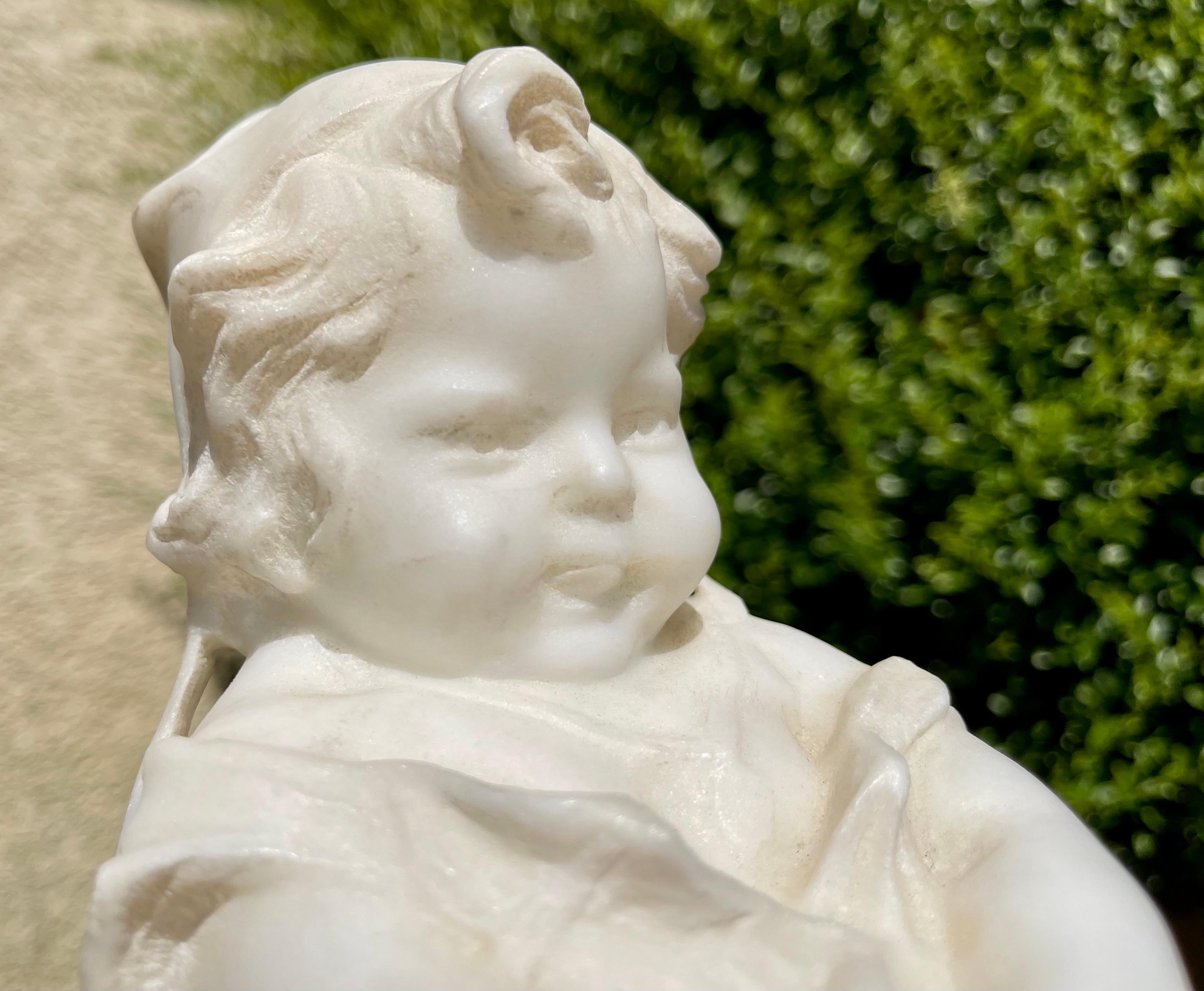 Rare and amusing sculpture in white Carrara marble representing a young girl pulling the tail of a cat. This subject rests on a sea green marble base. 
Very nice sculpture in very good condition. 19th century.