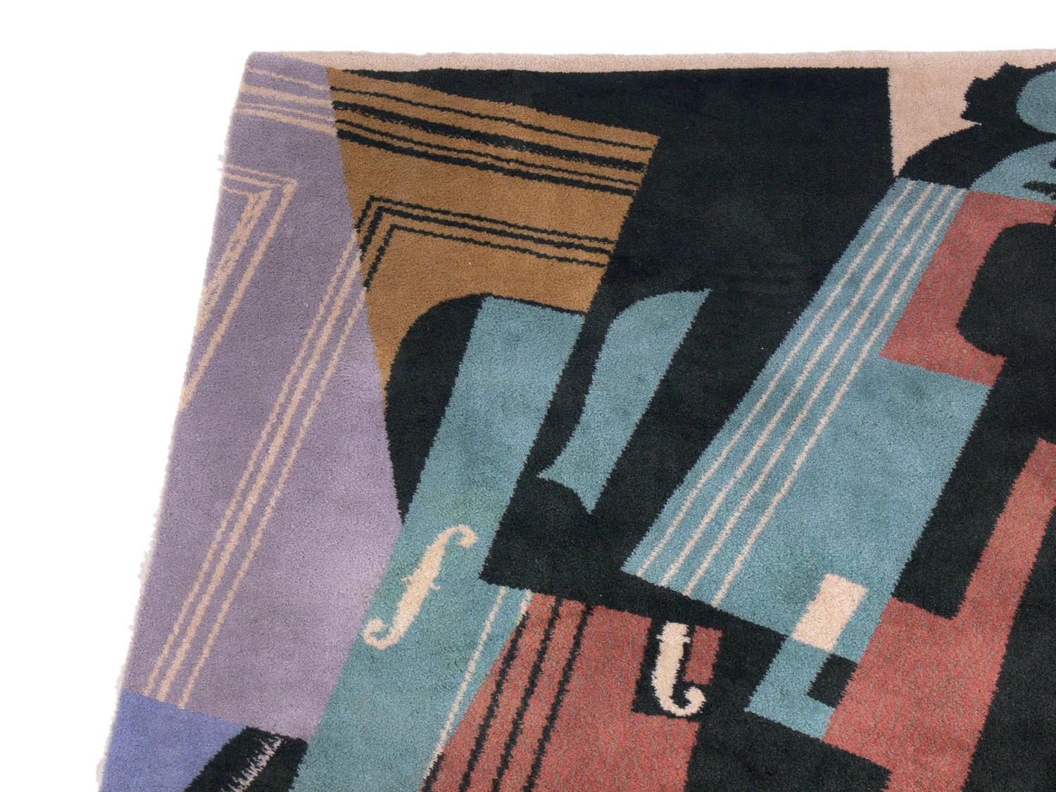 Vibrant cubist carpet or tapestry, based on a 1916 painting by Juan Gris, made by Ege Axminster A/S Art Line, Denmark, circa 1990s. Juan Gris signature woven in lower left hand corner of rug. It measures an impressive 71