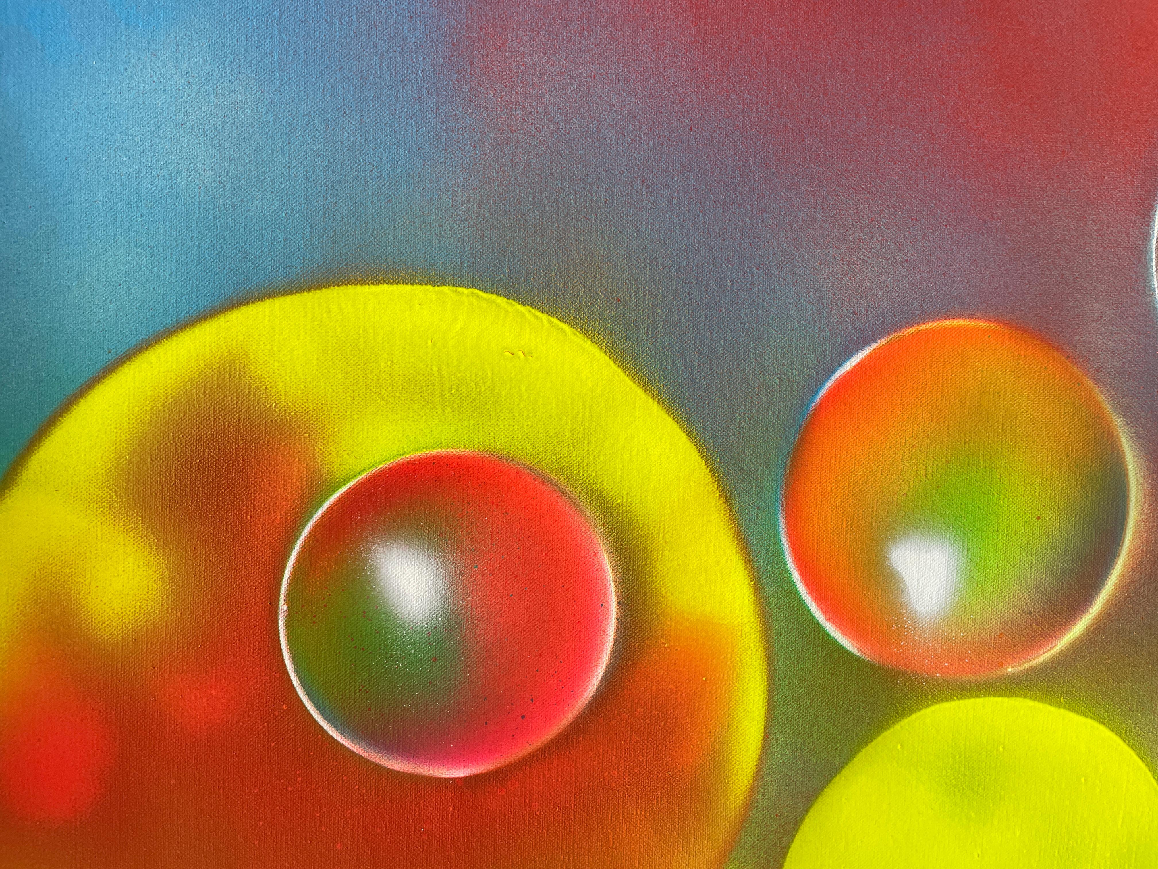 A vibrant composition of floating spheres that seem to dance in a gravity-free space. Intense colors—reds, greens, yellows, and blues—blend into a nebulous background, creating a sense of movement and depth. The piece evokes a visual choreography