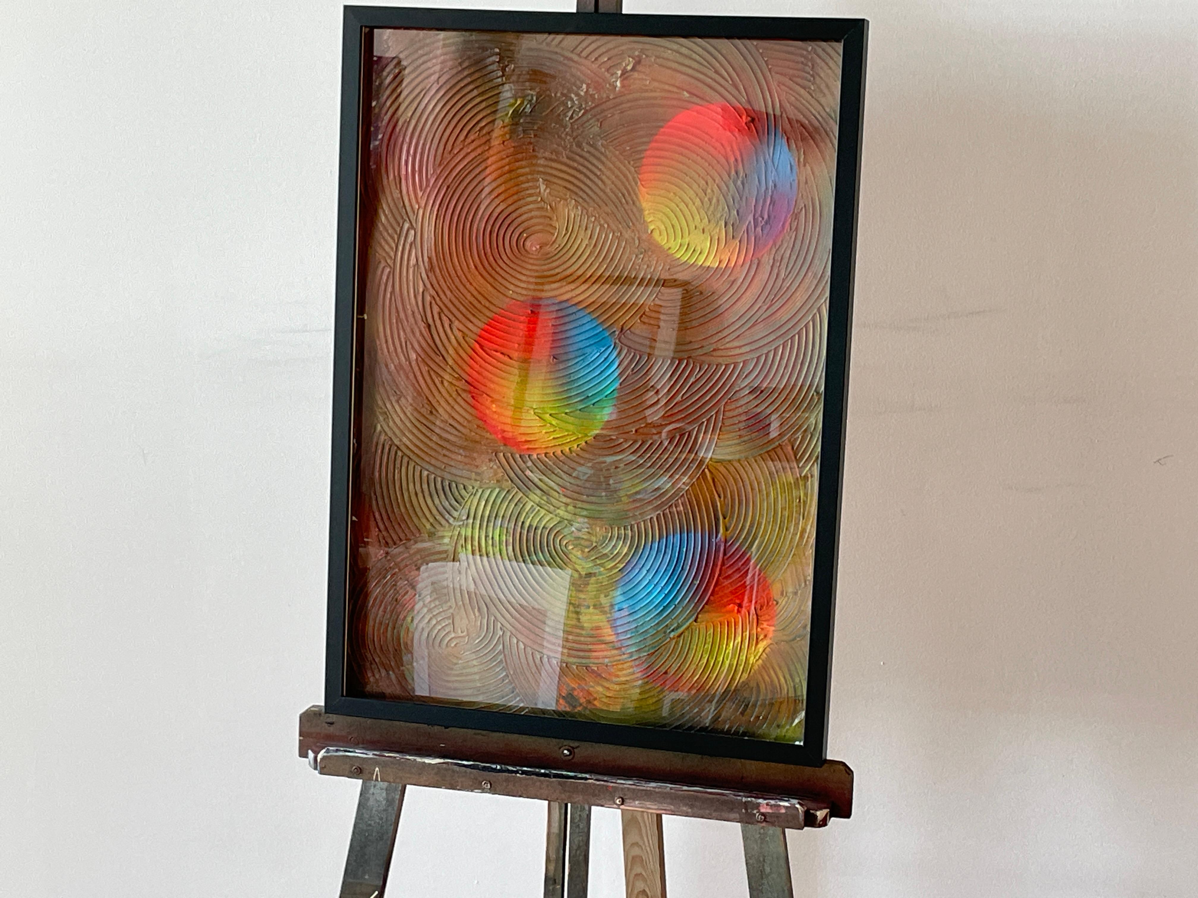 Abstract Transformation Circle 

This painting features an abstract artwork that combines resin techniques with circular relief on its surface. The resin, applied over the canvas, creates a smooth, glossy finish, while the relief in the form of