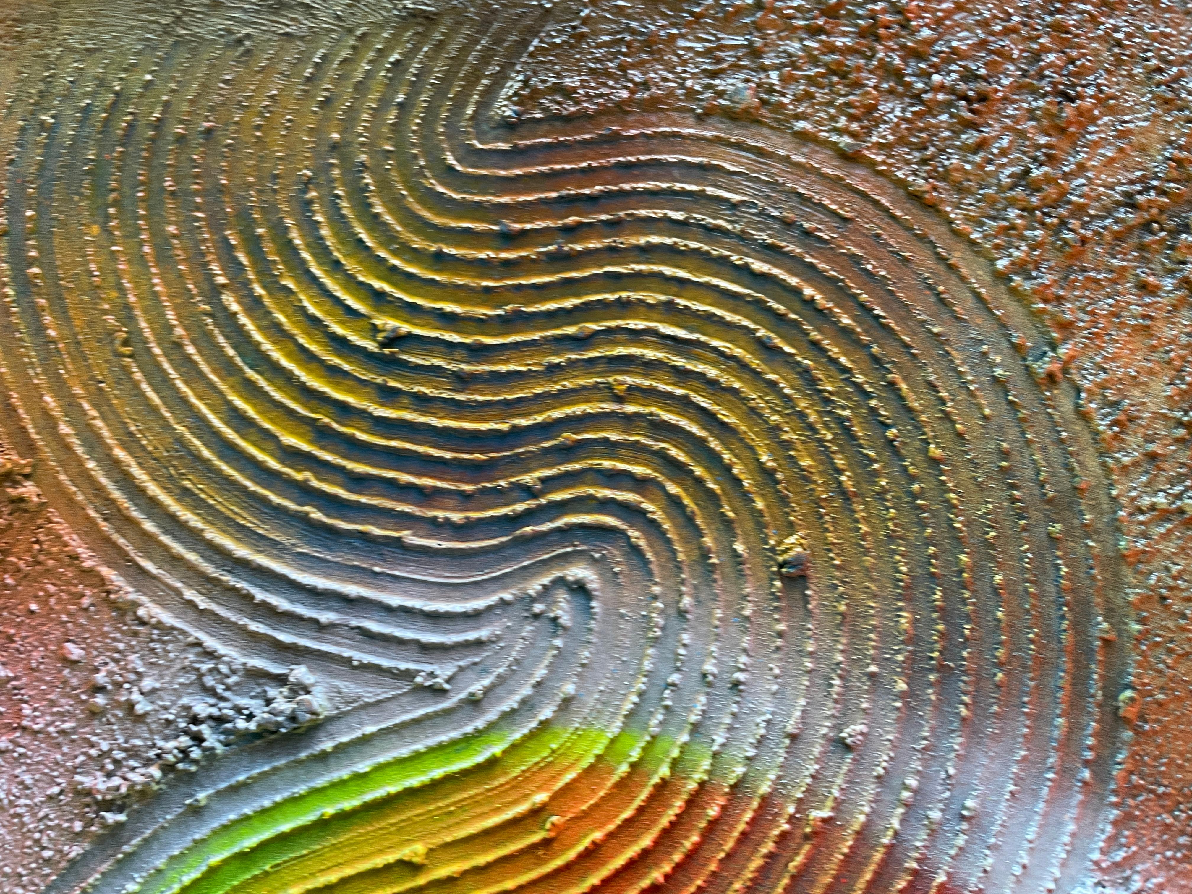 Abstract Transformation Circle 

This painting features an abstract artwork that combines resin techniques with circular relief on its surface. The resin, applied over the canvas, creates a smooth, glossy finish, while the relief in the form of