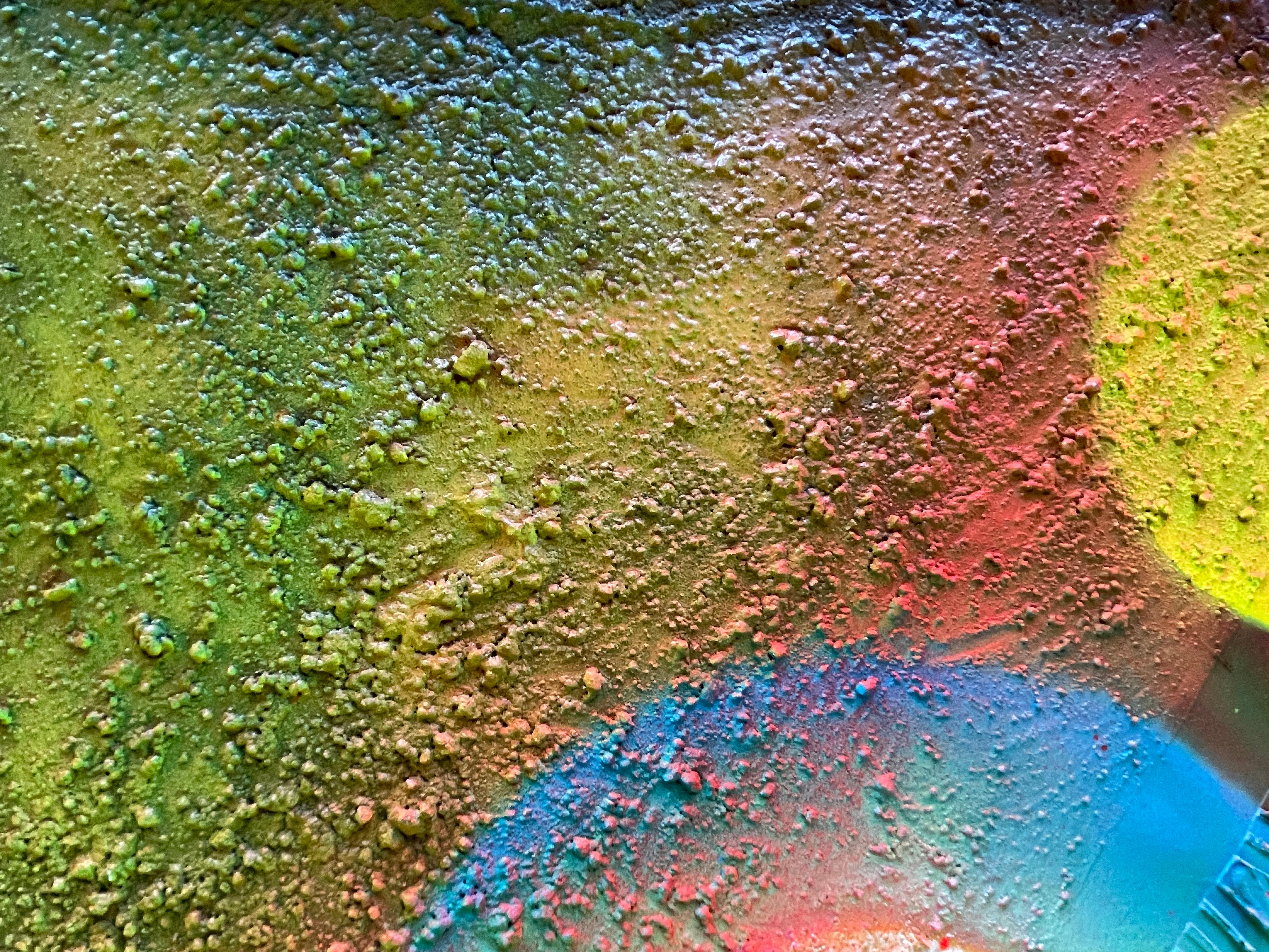 Abstract Transformation Circle 

This painting features an abstract artwork that combines resin techniques with circular relief on its surface. The resin, applied over the canvas, creates a smooth, glossy finish, while the relief in the form of