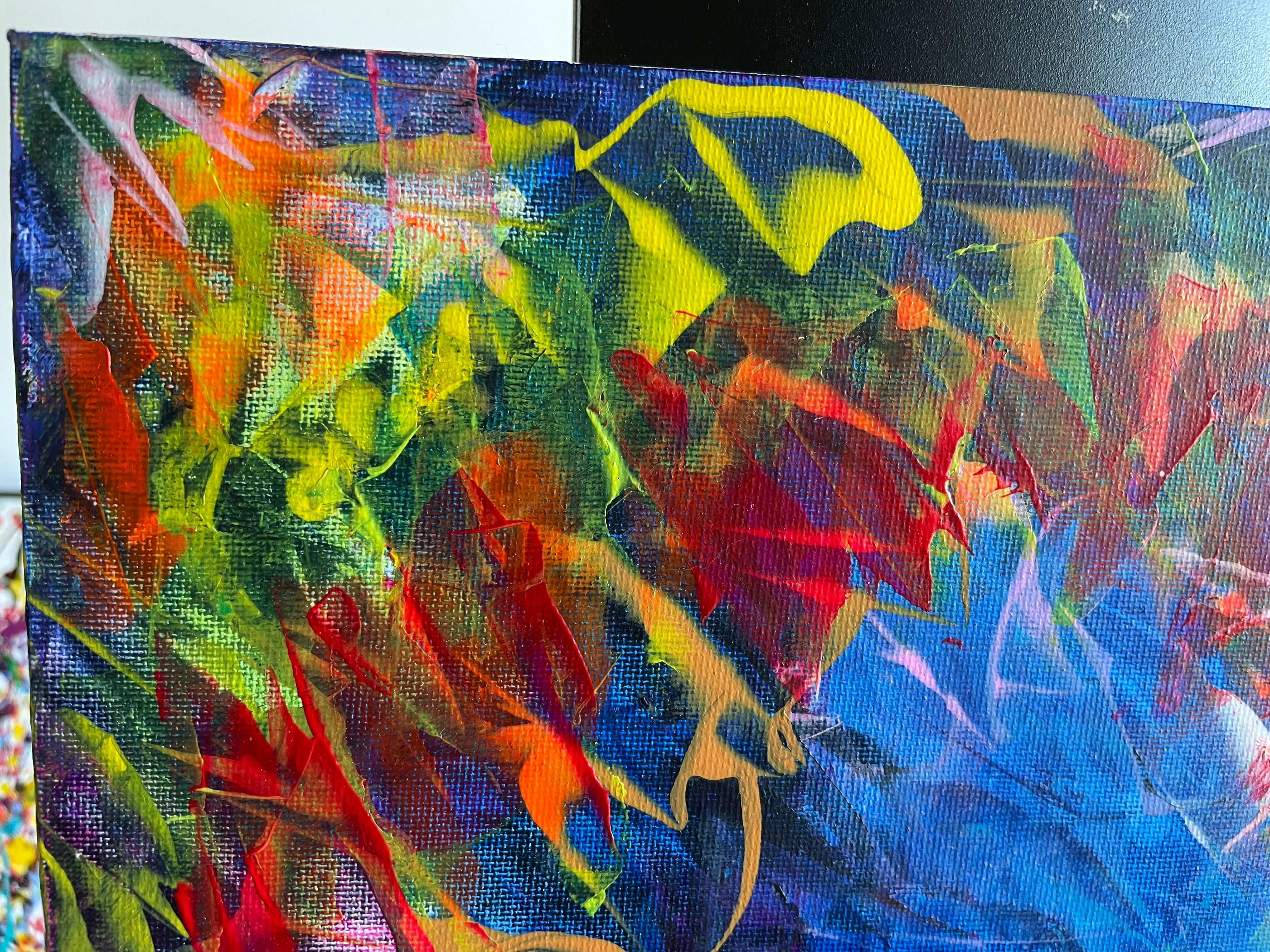 A painting in abstract acrylic is an explosion of shapes, textures, and colors that invite personal interpretation. Across the canvas, dynamic and free brushstrokes intertwine, creating layers of depth and movement. Vibrant tones, like intense reds