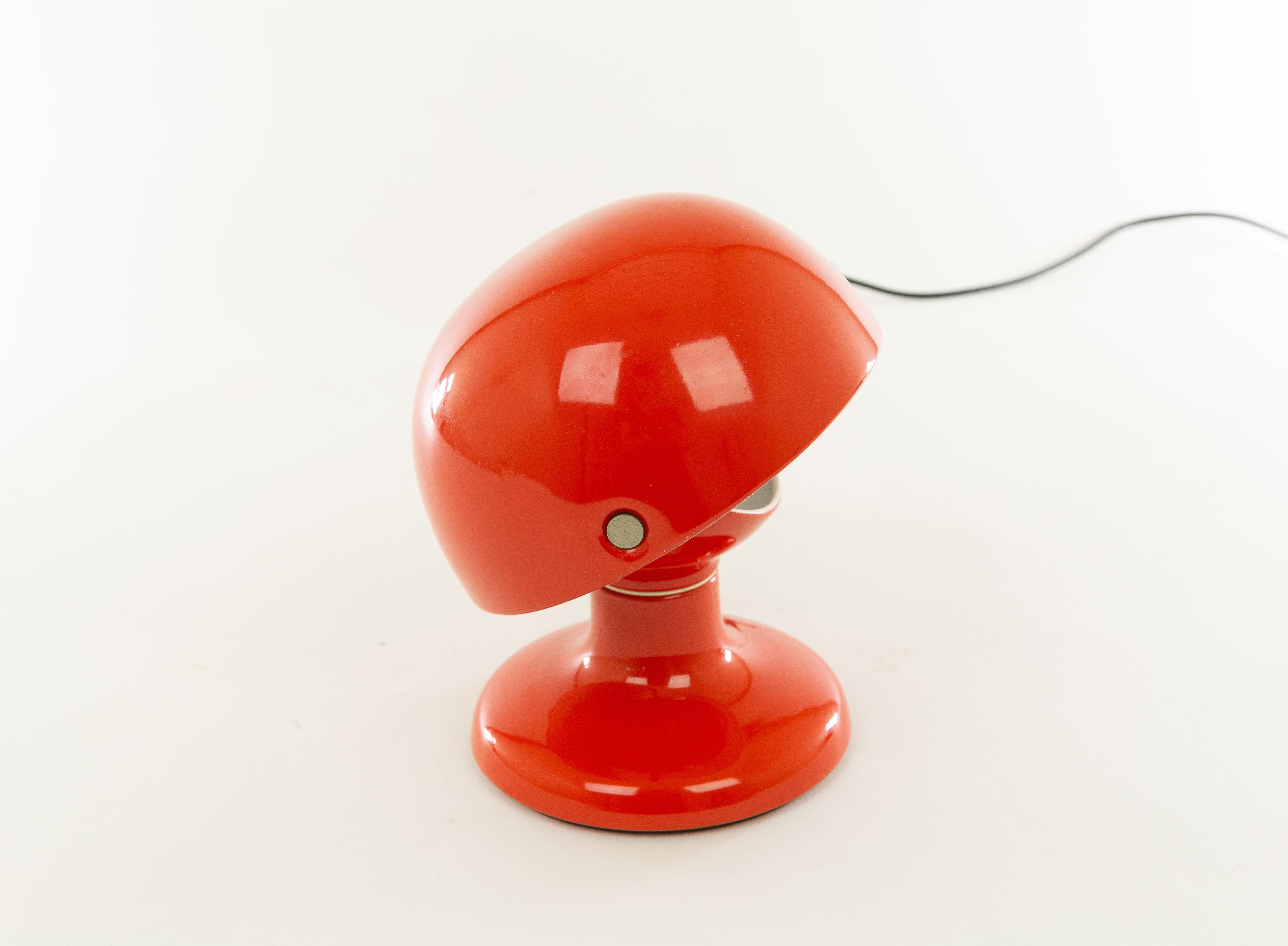 Red Jucker table lamp designed by Tobia Scarpa in 1963 and produced by Flos.

As described in a Flos catalogue: 