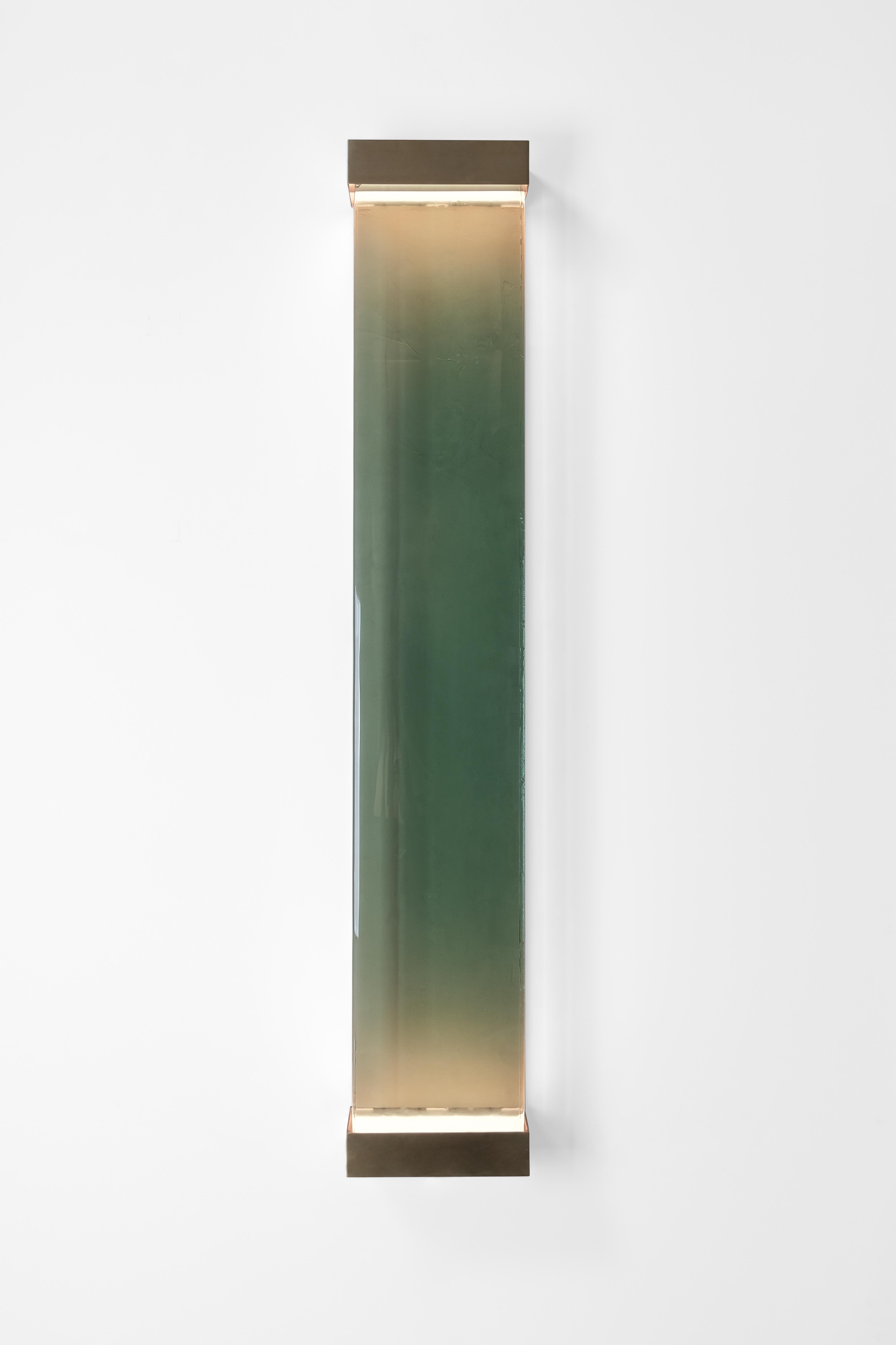 Jud wall lamp by Draga & Aurel
Dimensions: W 23, D 10, H 131
Materials: Resin and brass

All our lamps can be wired according to each country. If sold to the USA it will be wired for the USA for instance.

Inspired by minimalism, the Jud lamps are