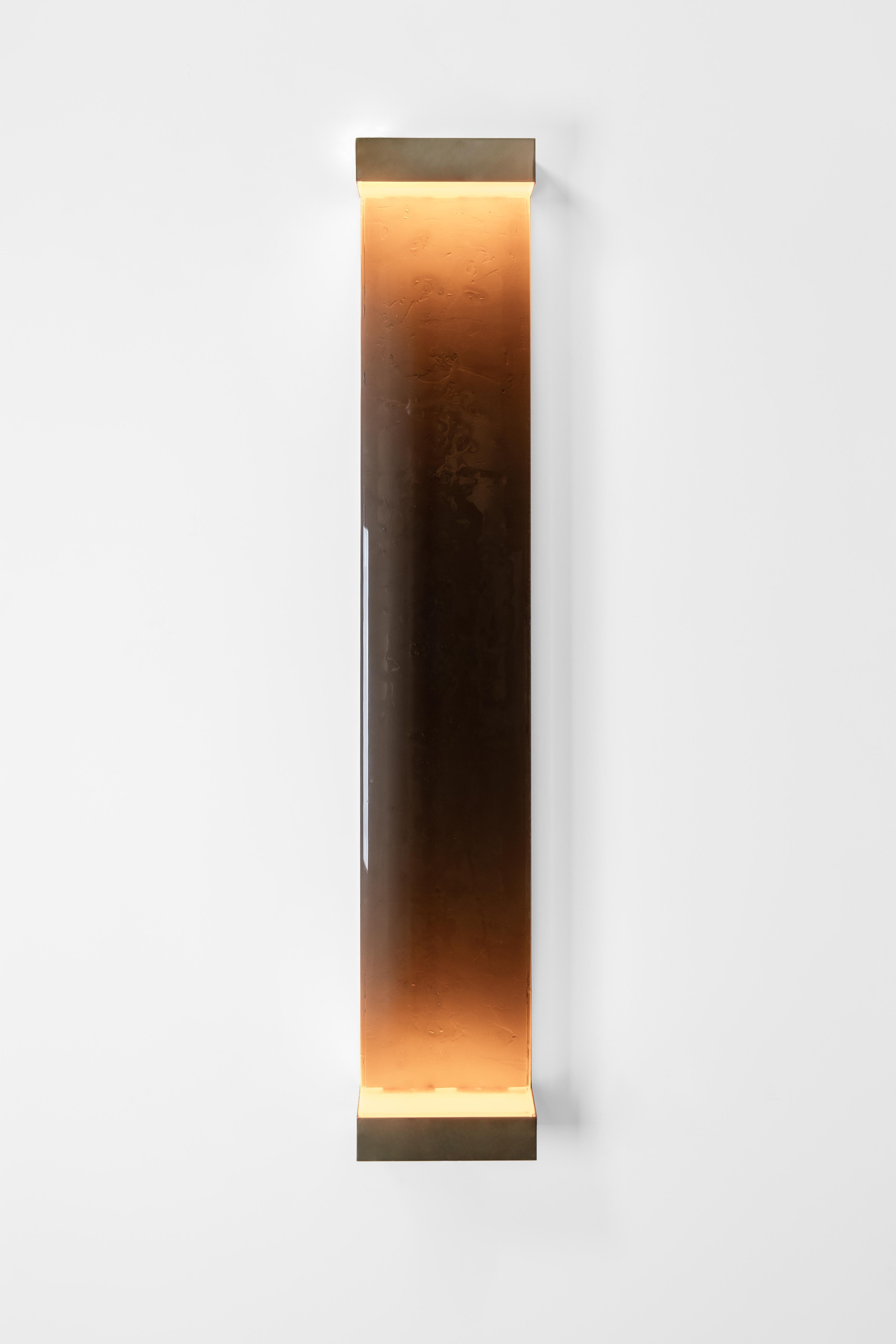 Jud wall lamp by Draga & Aurel.
Dimensions: W 23, D 10, H 131.
Materials: resin and brass.

All our lamps can be wired according to each country. If sold to the USA it will be wired for the USA for instance.

Inspired by minimalism, the Jud