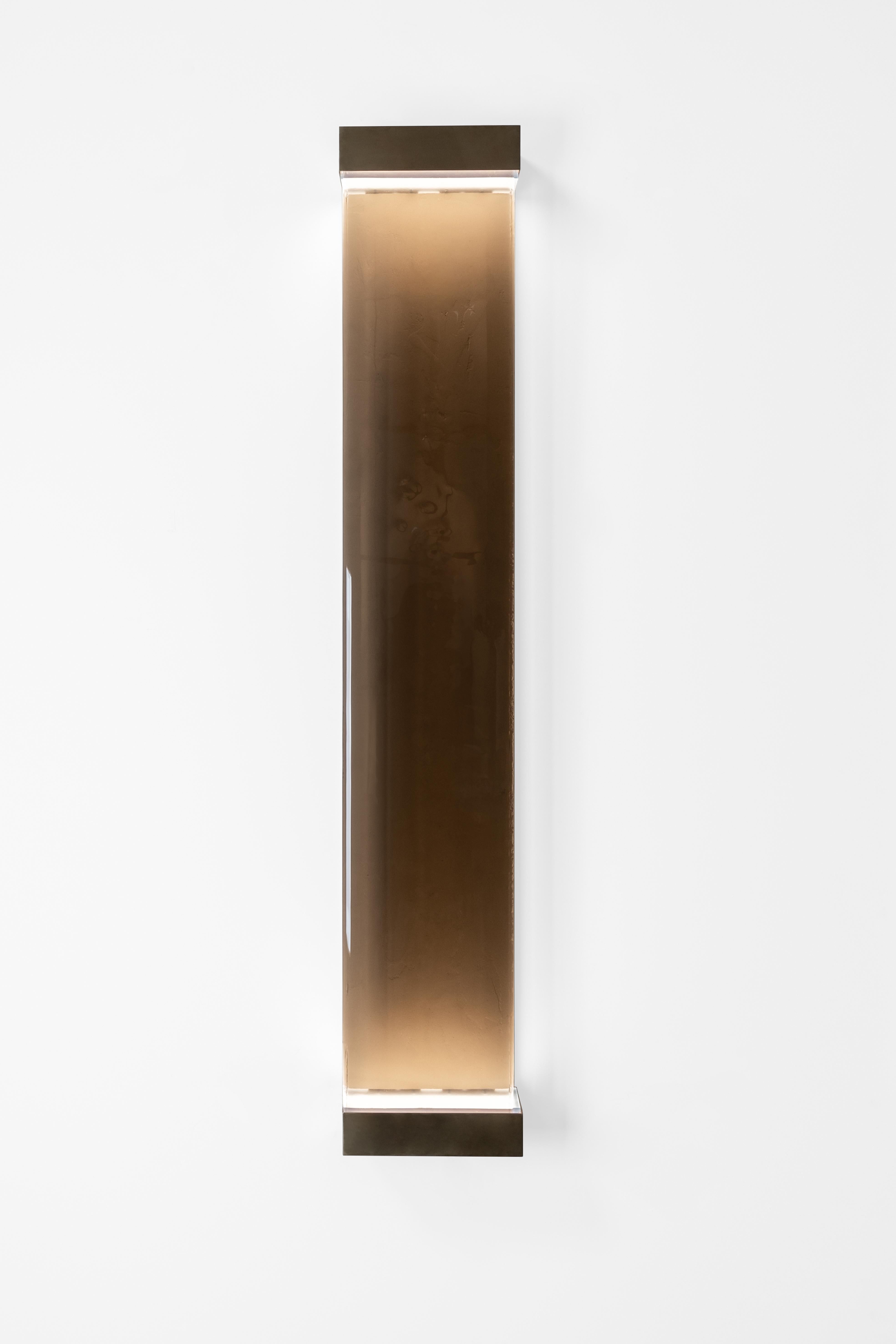 Jud wall lamp by Draga & Aurel
Dimensions: W 23, D 10, H 131
Materials: Resin and brass

All our lamps can be wired according to each country. If sold to the USA it will be wired for the USA for instance.

Inspired by minimalism, the Jud lamps are