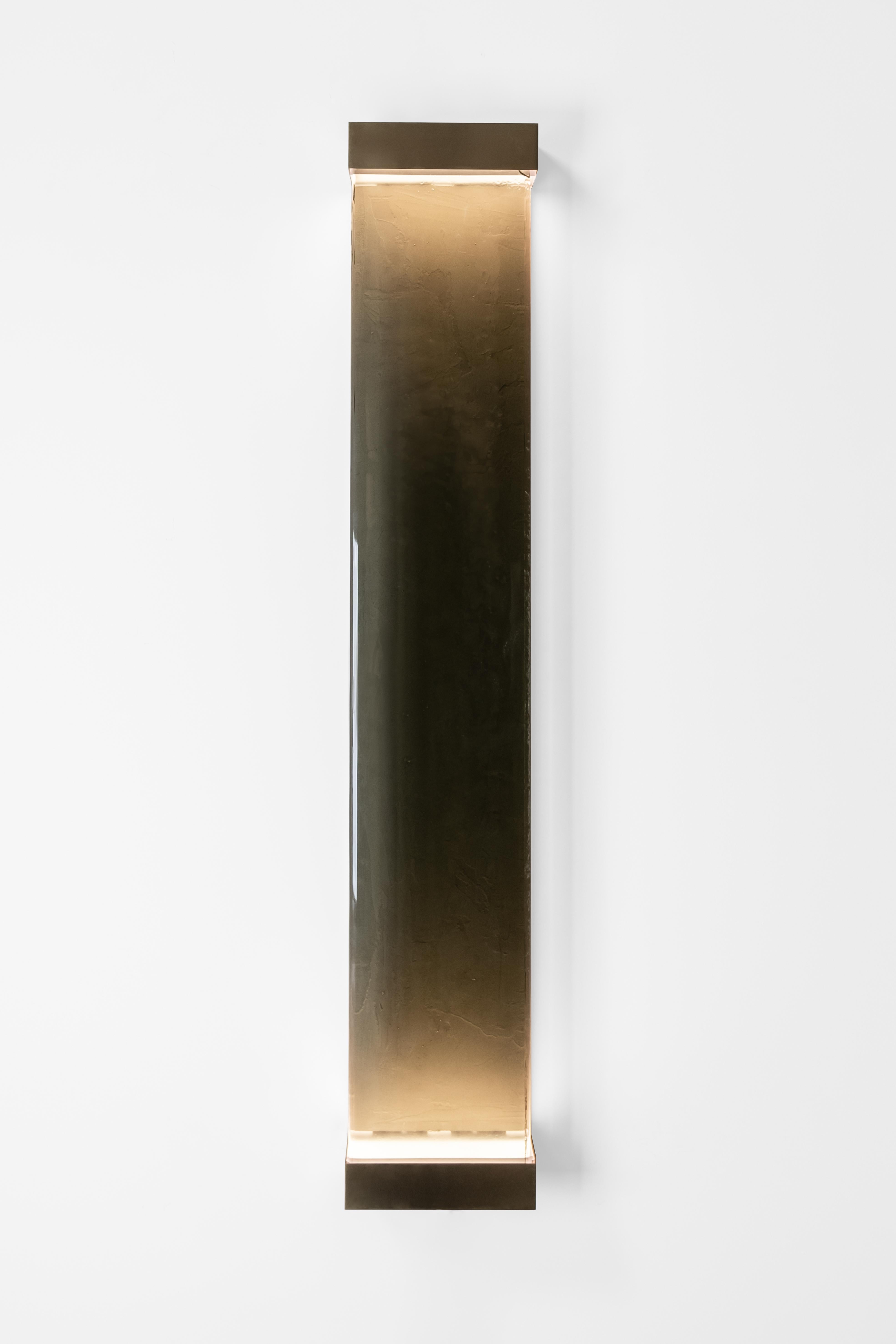 Jud wall lamp by Draga & Aurel
Dimensions: W 23, D 10, H 131
Materials: Resin and brass

All our lamps can be wired according to each country. If sold to the USA it will be wired for the USA for instance.

Inspired by minimalism, the Jud lamps are