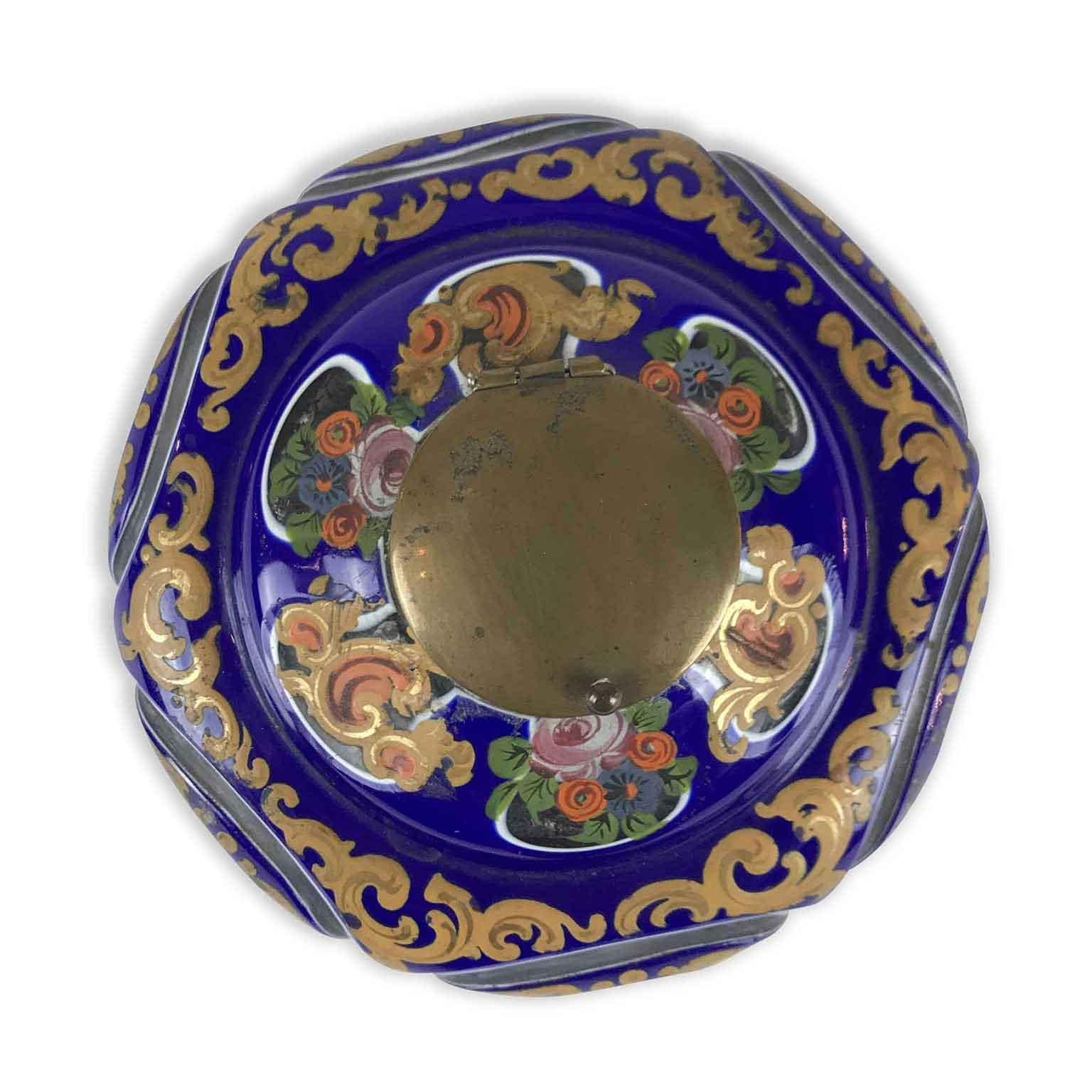 Early 19th Century Jewish Glass Ink pot dating back to the Biedermeier period, of European Austro-Hungarian origin. Circular shape, this clear jacketed glass inkwell  has a blue and white layers and is fully decorated with lovely green vegetal