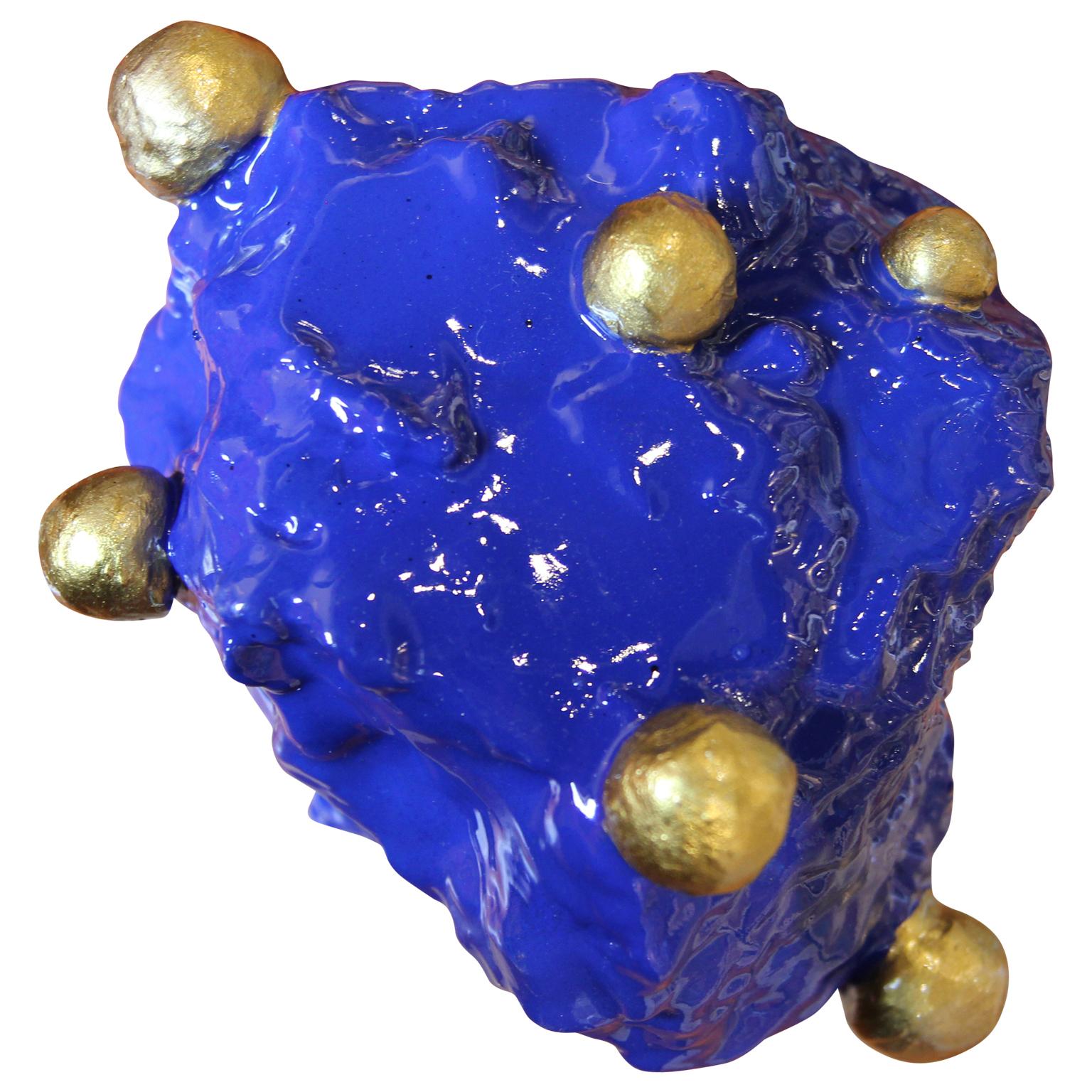 Scultura decorativa blu e oro 