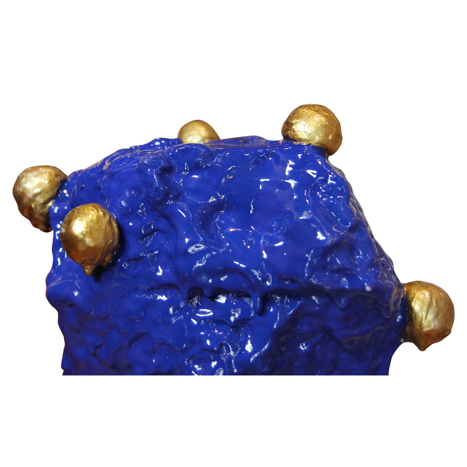 Blue decorative sculpture with gold accents by Houston, TX contemporary artist Jude Rosemond. Sculpture is made from concrete, clay, stone with rosewater as the liquid base. This sculpture is a great, fun and classy addition to a modern contemporary