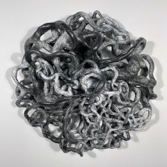 EMBRANGLE, gray monochrome circular ceramic wall sculpture relief