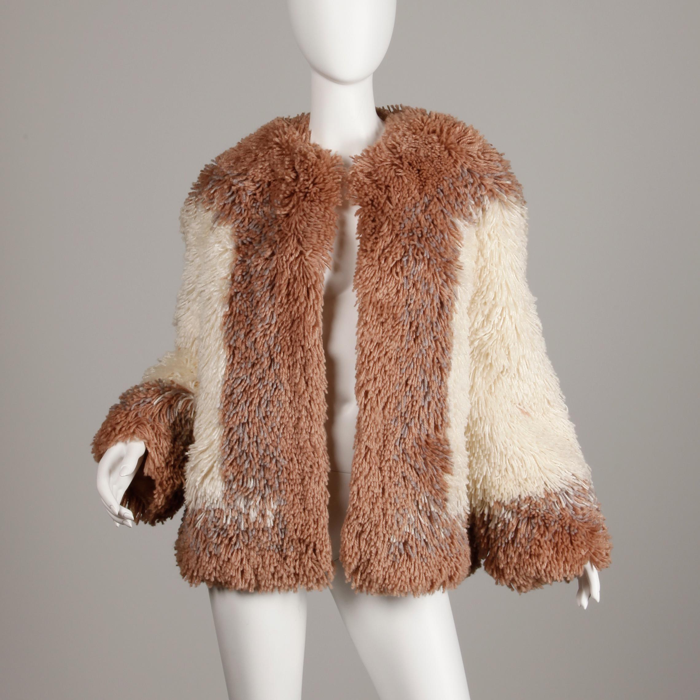 Incredible heavy weight shaggy wool jacket in two tone brown and beige by Judith Ann. A great fur alternative with the same winter warmth! Fully lined with no closure (hangs open). Hidden side pockets. Fits like a modern size large-extra large. The