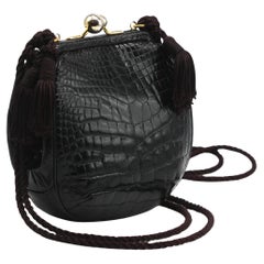 Porte-monnaie en alligator noir de Judith Leiber