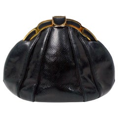 Judith Leiber Clutch a scatto in lucertola nera e tonalità oro, circa anni '80