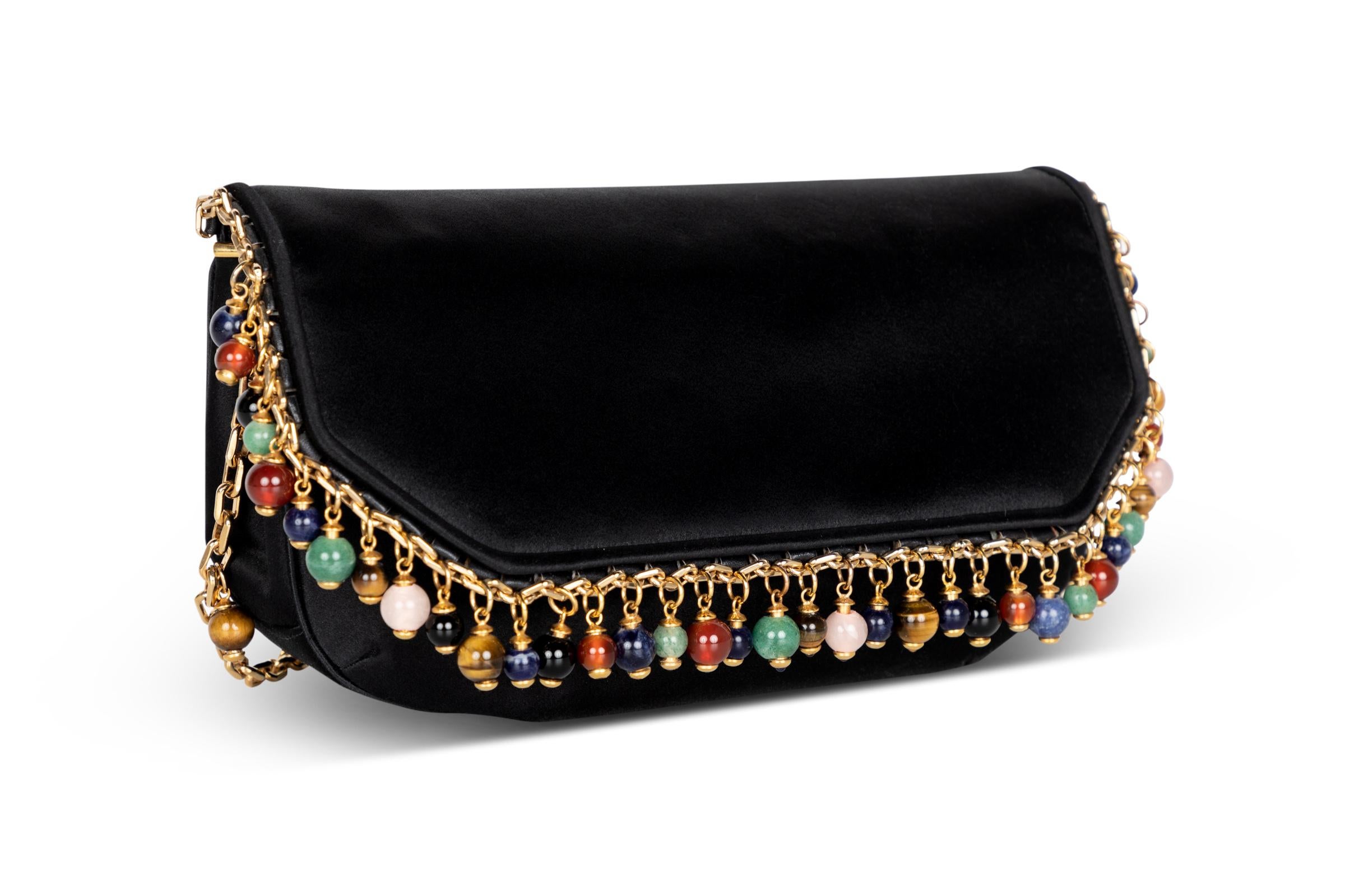 black clutch with gold chain