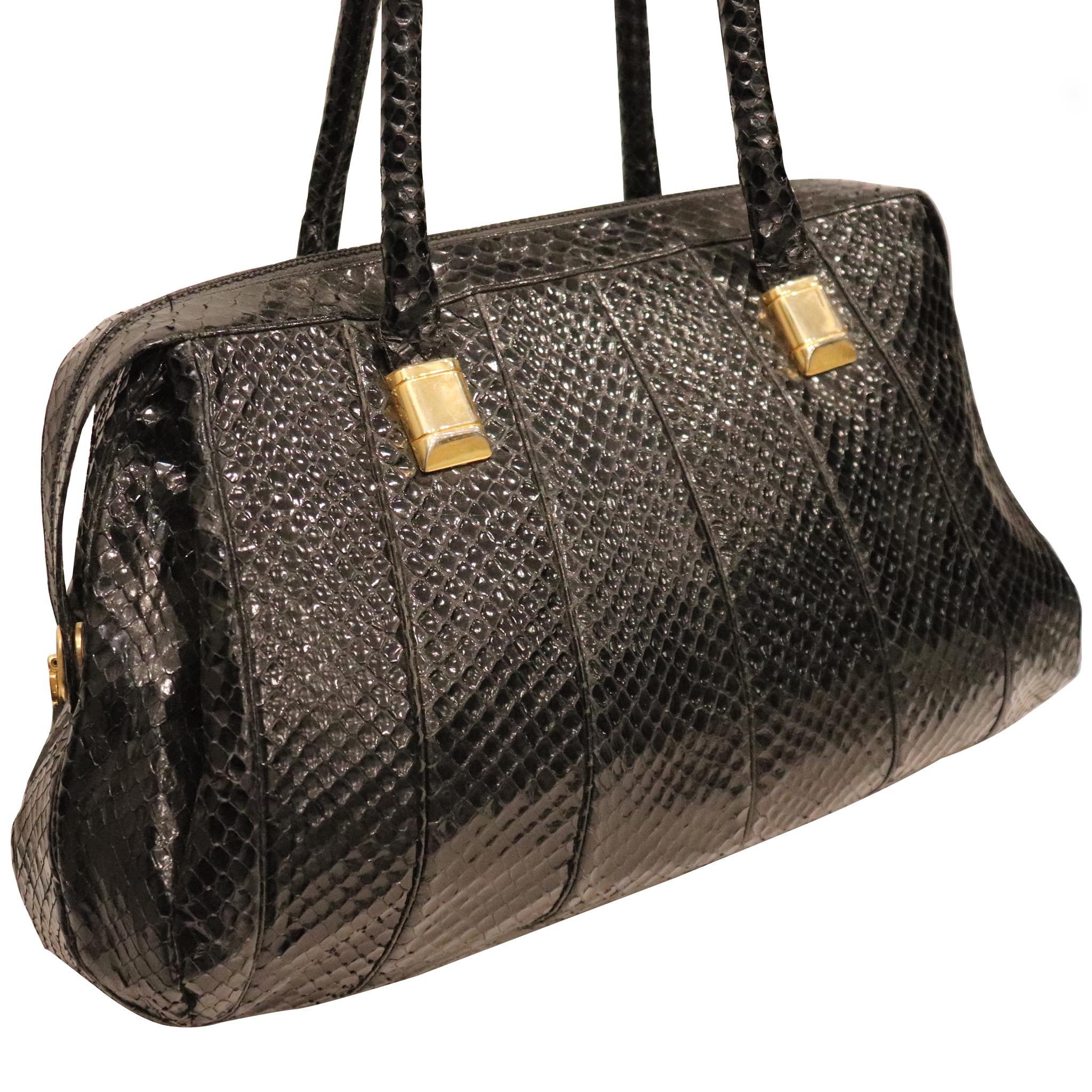 Judith Leiber Black Snake Skin Bag W/ Gold Detail. From 1980s in excellent condition, 

Measurements:

Length - 16 inches
Height - 9 inches 
Width - 6 inches 