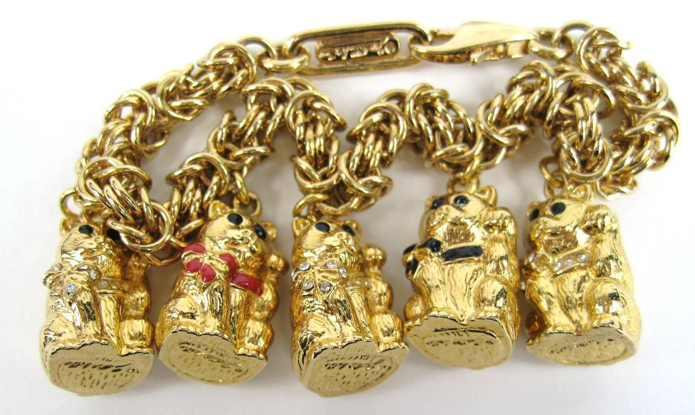 New Never worn Judith Leiber Charm Bracelet. Alternating bows and the adorable bears with Swarovski Crystals set in the bows. Will fit a 6 to 7-1/4 in wrist nicely. Has Original Box. This is out of a massive collection of Hopi, Zuni, Navajo,