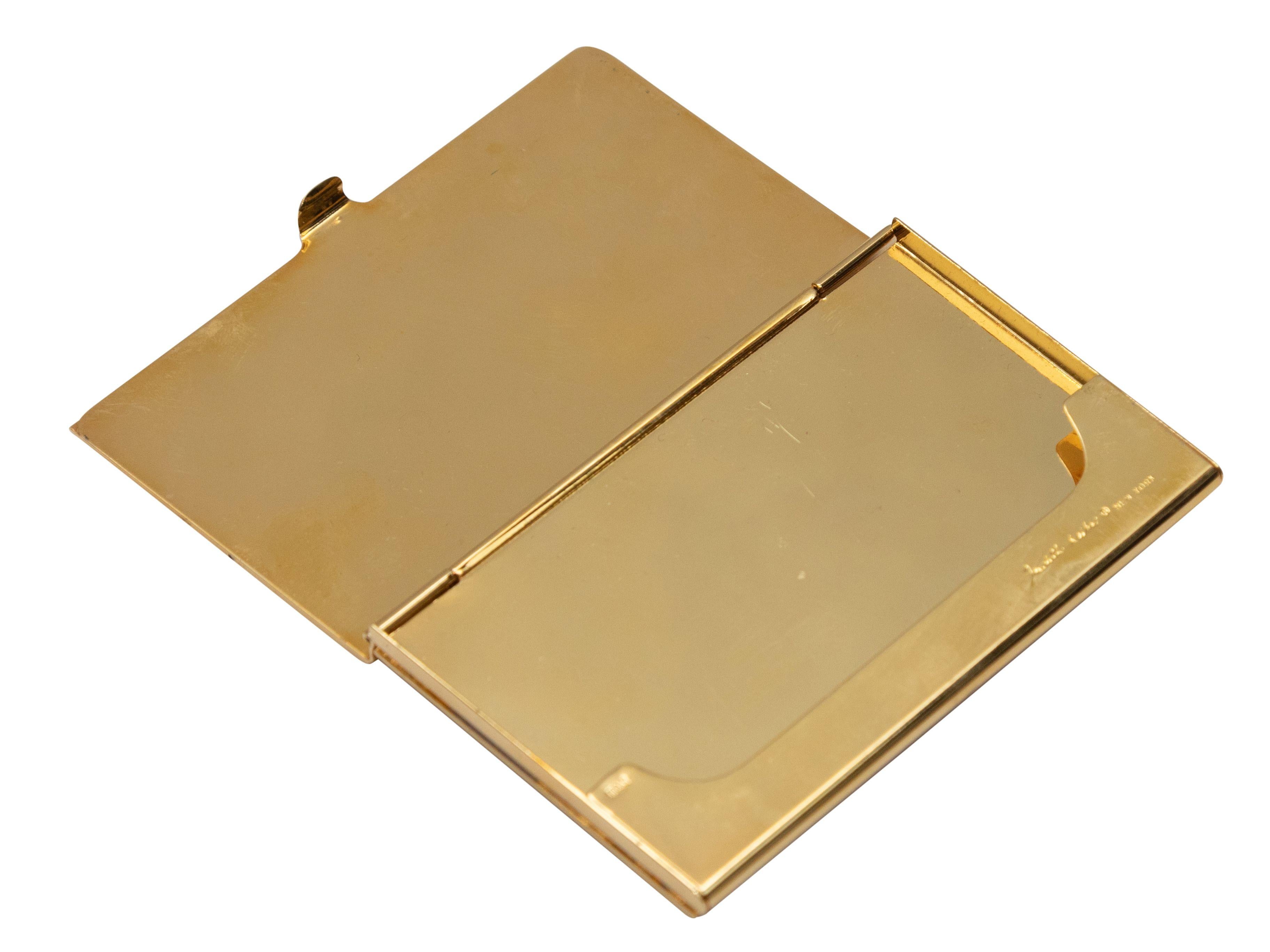 Product Details: Cocoa rhinestone and gold-tone metal card case by Judith Leiber. Bottom push closure. 2.25
