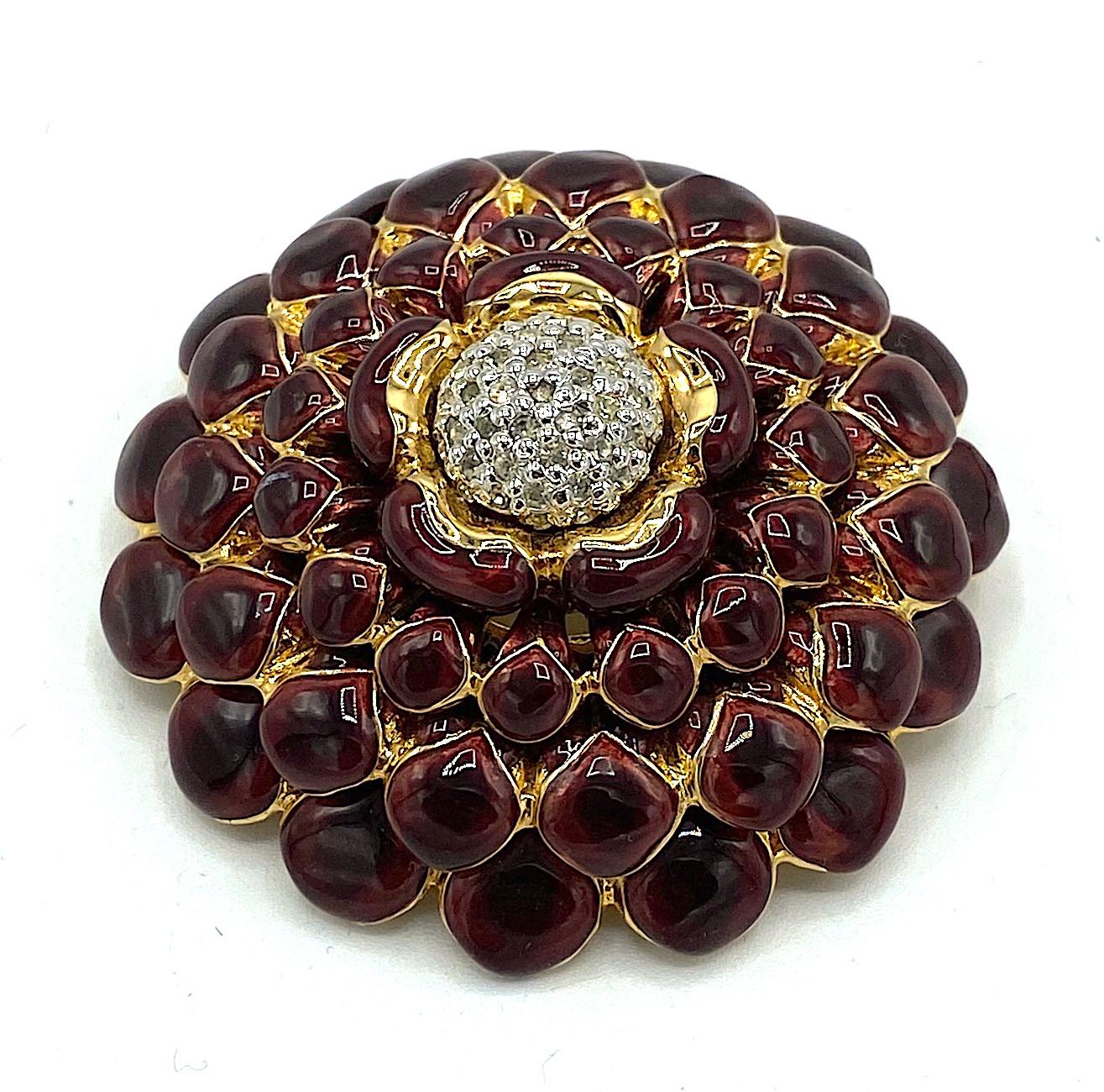 A beautifully made dark purple plum enamel on gold flower brooch by famous fashion designer Judith Leiber. The craftsmanship is super as all her creations are known to be. Judith's jewelry pieces were made in limited and small collections. The plum