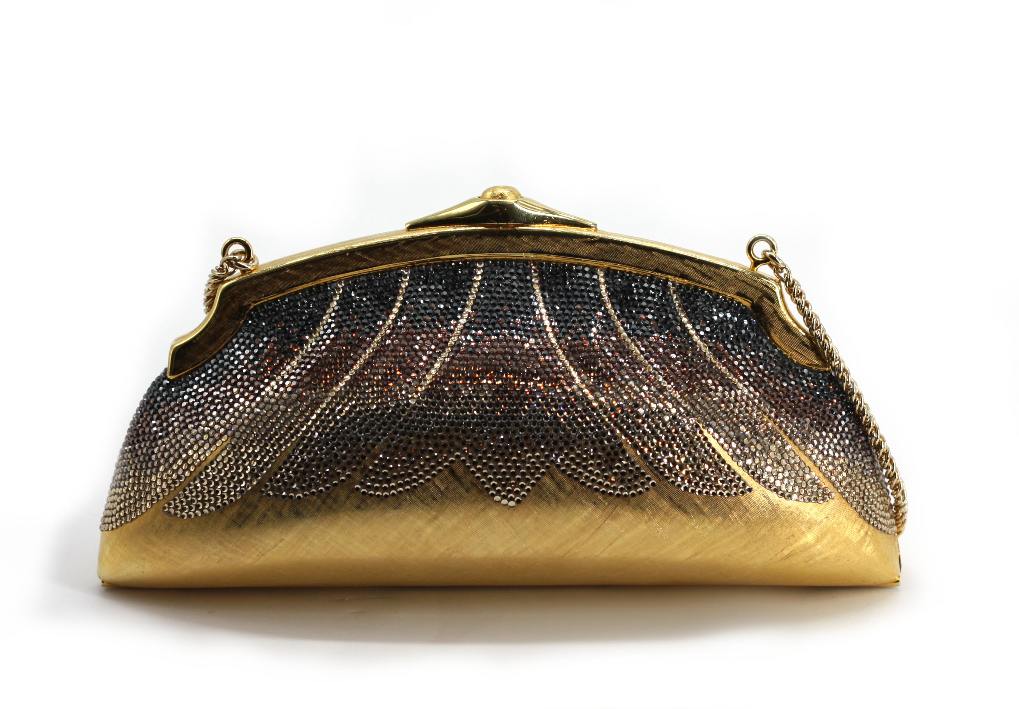 
Judith Leiber Gilt Metal and Crystal Evening Clutch, Prototype
Signed. A prototype, the upper portion fitted with crystals to create a grayscale ombre effect.
Width 7.5 in.
Condition Report
Good condition.