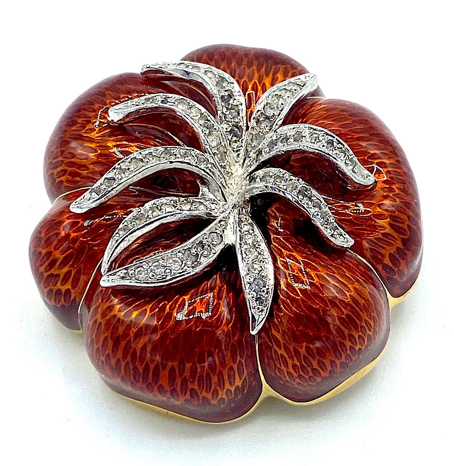 A beautifully made honey gold amber color enamel petal flower brooch by famous fashion designer Judith Leiber. The craftsmanship is super as all her creations are known to be. Judith's jewelry pieces were made in limited and small collections. The