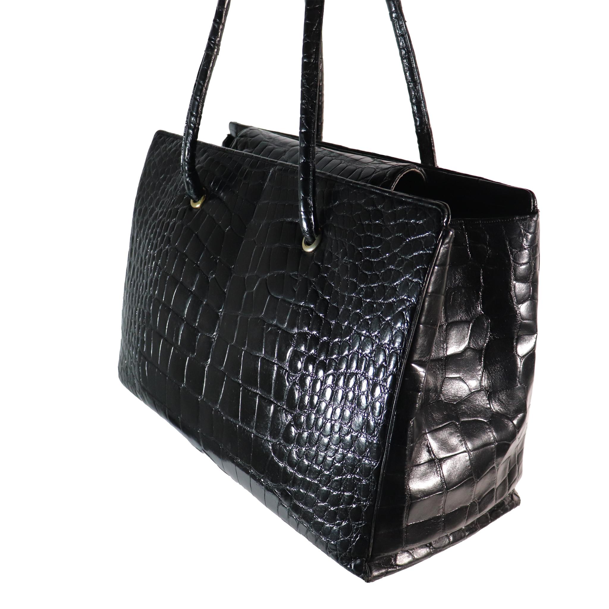 Judith Leiber Large Black Crocodile Purse with Snap Top. In Excellent condition, This hand bag or tote can be used for carrying laptop, iPad as well. 
VERY RARE 

Measurements:

Height - 10.5 Inches 
Width - 15.5 Inches 
Height with Strap - 20.5