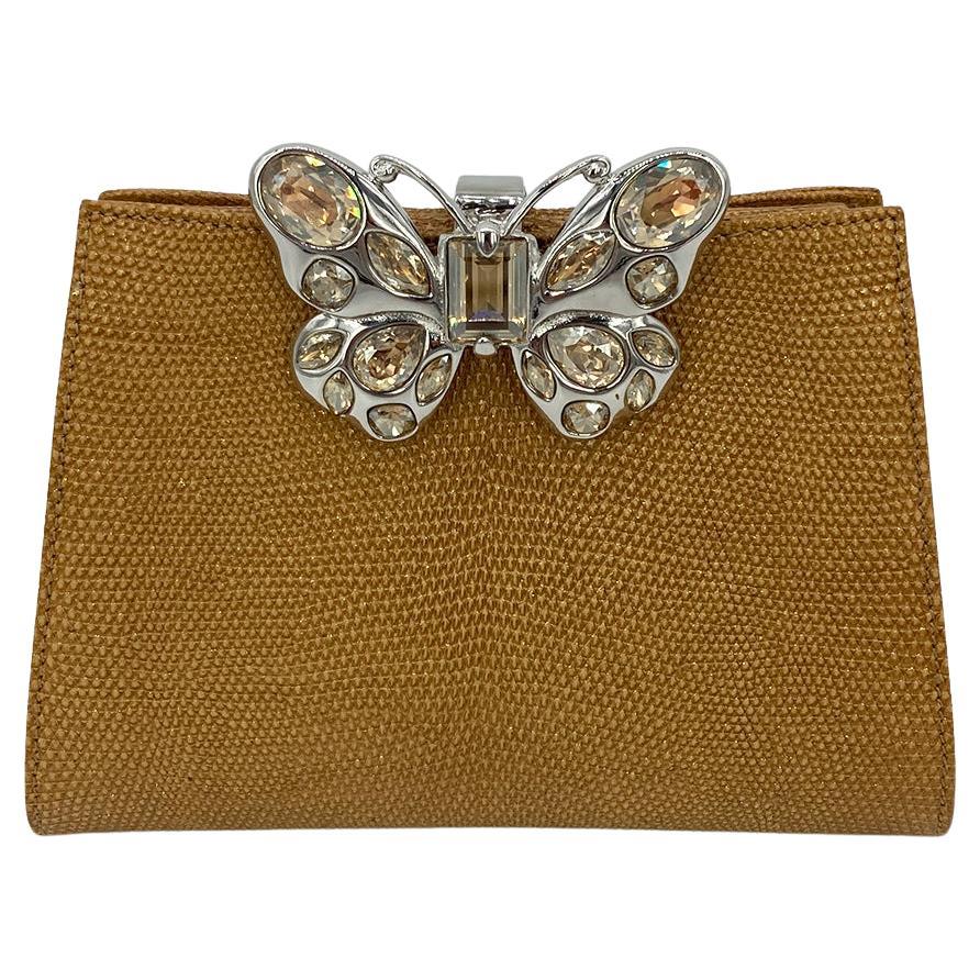 Judith Leiber - Pochette en lézard métallisé en forme de papillon en vente