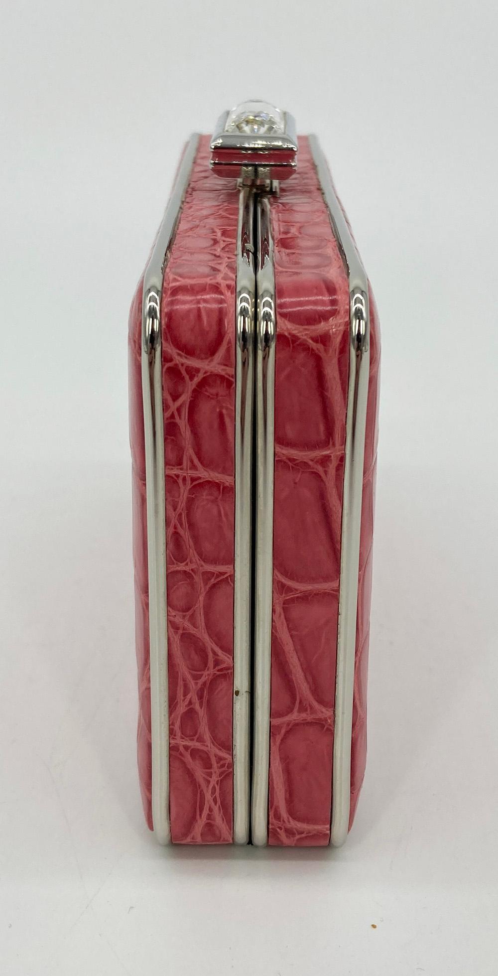 Judith Leiber Pink Alligator Box Clutch in excellent condition. Pink alligator trimmed with silver hardware and top crystal button closure. pink satin interior with attached silver chain shoulder strap. no stains smells or scuffs. clean corners