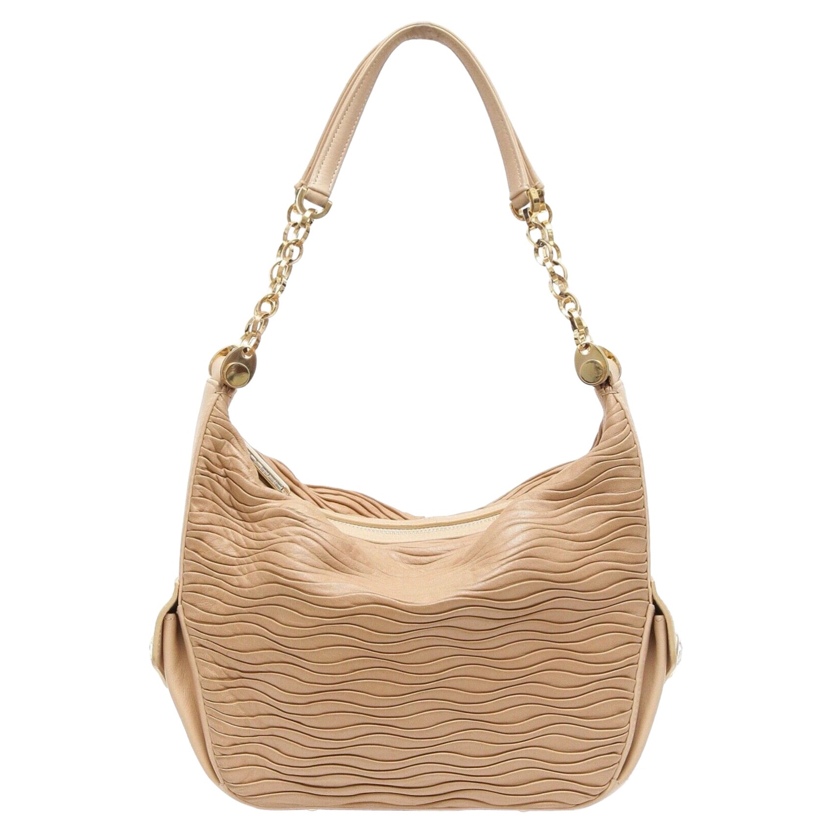 GUARANTEED AUTHENTIC JUDITH LEIBER BEIGE PLEATED LEATHER SHOULDER BAG

Authenticated by Authenticatefirst


Design: 
- Supple beige pleated leather.
- Double chain link and leather shoulder straps.
- Dual side patch pockets with crystal turn lock
