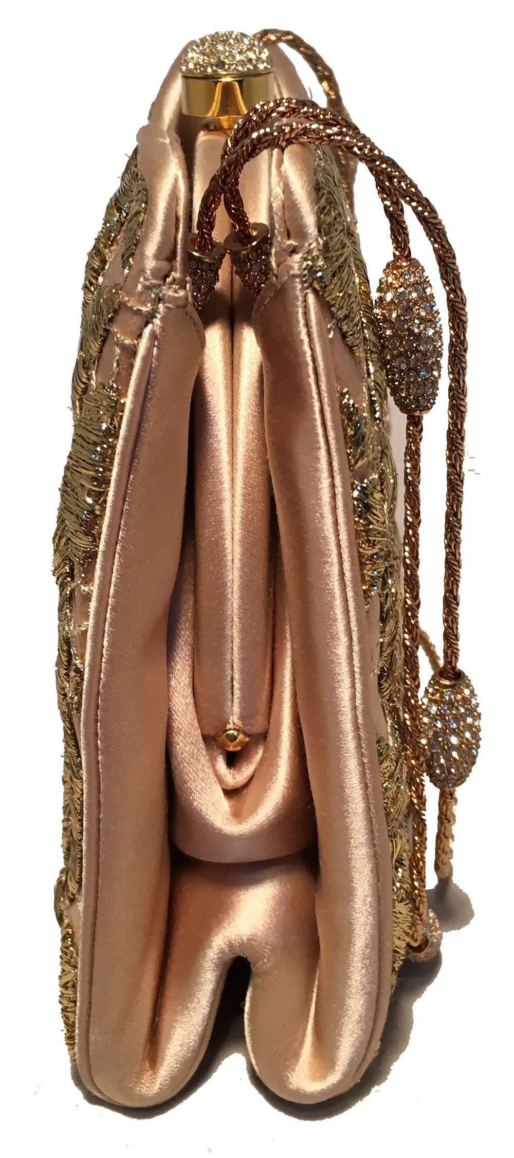 FABULOUS Judith Leiber Silk and Gold Embroidery Evening Bag in excellent condition.  Beige silk exterior with gold embroidered leaves throughout. Gold chain handles with clear crystal accents. Top button closure opens to a beige silk lined interior