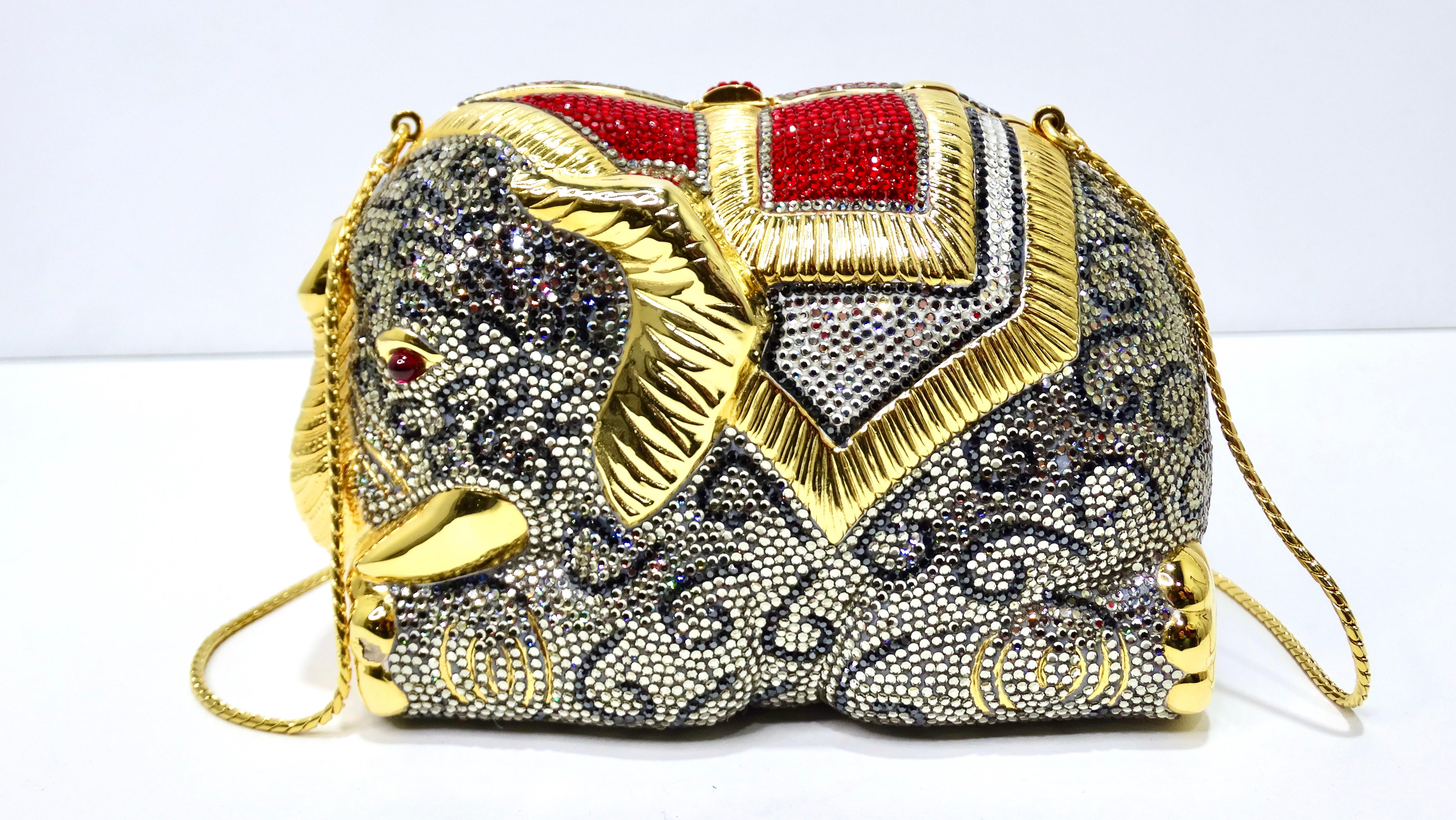 Snag this Judith Leiber minaudiere that is nothing short of exotic and elegant! This elephant minaudiere, inspired by rich Indian culture is featured in full Swarovski Crystal. Judith Leiber creates some of the most beautifully crafted evening bags.