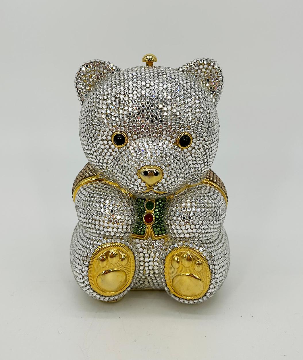 Judith Leiber Swarovski Crystal Teddy Bear Minaudiere in very good condition. Signature judith leiber minaudiere in timeless teddy bear shape. Bear's body features clear crystals over gold tone hardware wearing a green and tan vest with gold