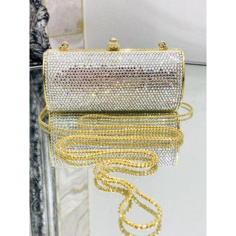 Judith Leiber Swarovski Minaudière Bag 

Golden shimmering hard case bag which is fully adorned in exceptionally bright shining Swarovski through out. With a top jewel closure and removable gold chain strap.

Additional information:
Size – 13 W x